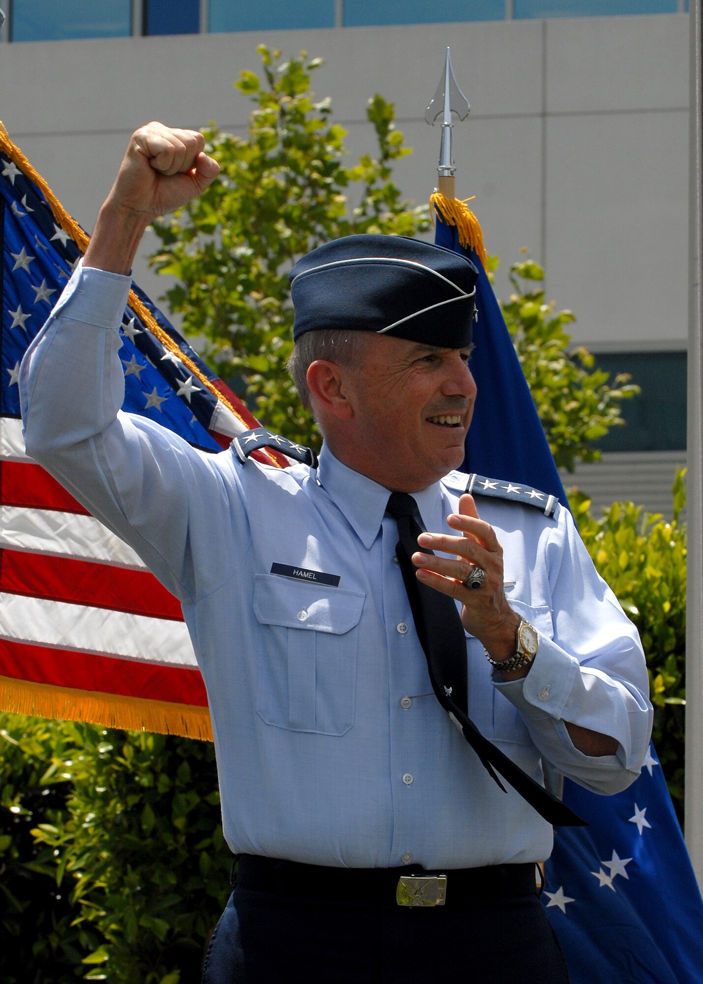 Lt. Gen. Michael Hamel leads the crowd in singing the Air Force song. The general bid farewell to the SMC workforce, May 15. (Photo by Joe Juarez)