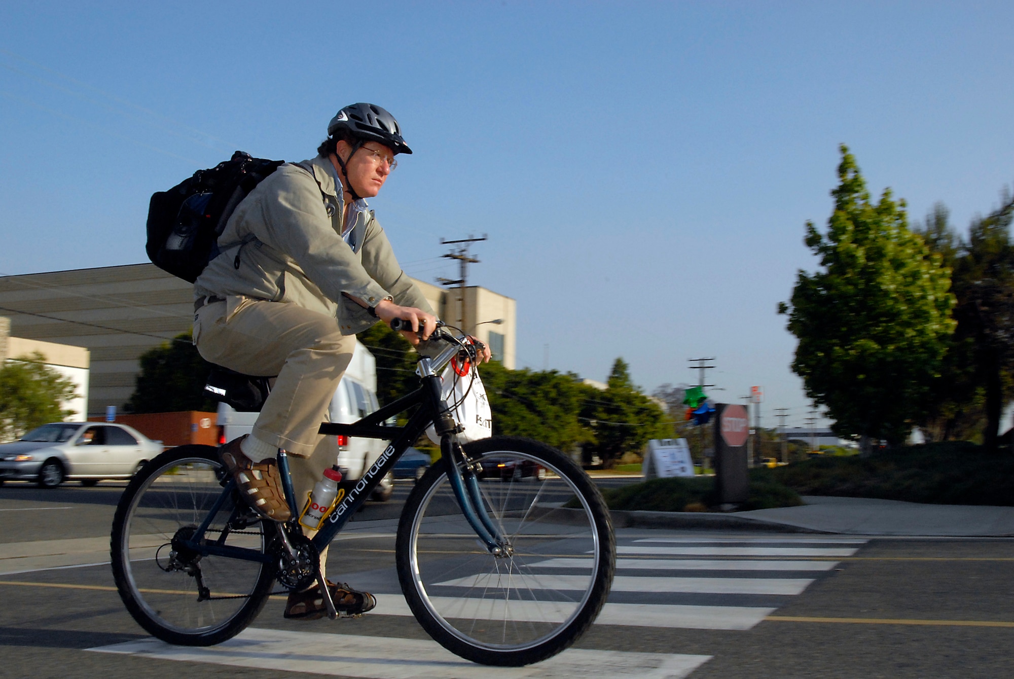 Jeff Fuller rides his bike to work, May 13. Personnel from Los Angeles AFB, The Aerospace Corporation and other local companies took the challenge to ride their bikes to work including a group that rode more than 20 miles from Fort MacArthur. (Photo by Joe Juarez)