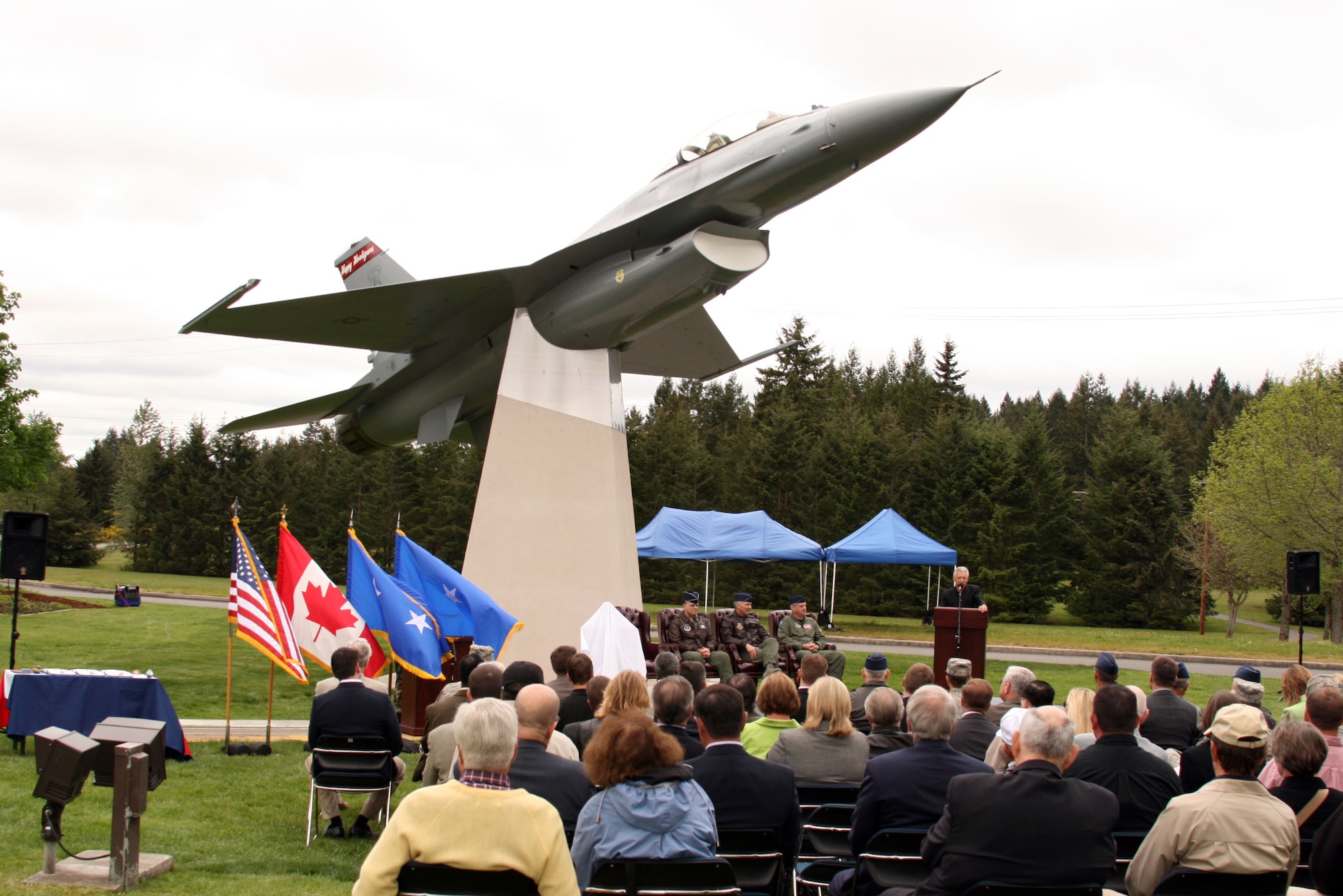The F-16 fighter's place in air defense history is assured with this permanent display of aircraft #82-929, which was scrambled over the eastern coast on Sept. 11, 2001. The pilot on that eventful day, Lt. Col. Brad Derrig, attended the dedication ceremony at the Western Air Defense Sector on May 21 and talked about the shock and drama of combat air patrols on that date. (U.S. Air Force photo/Randy Rubattino)