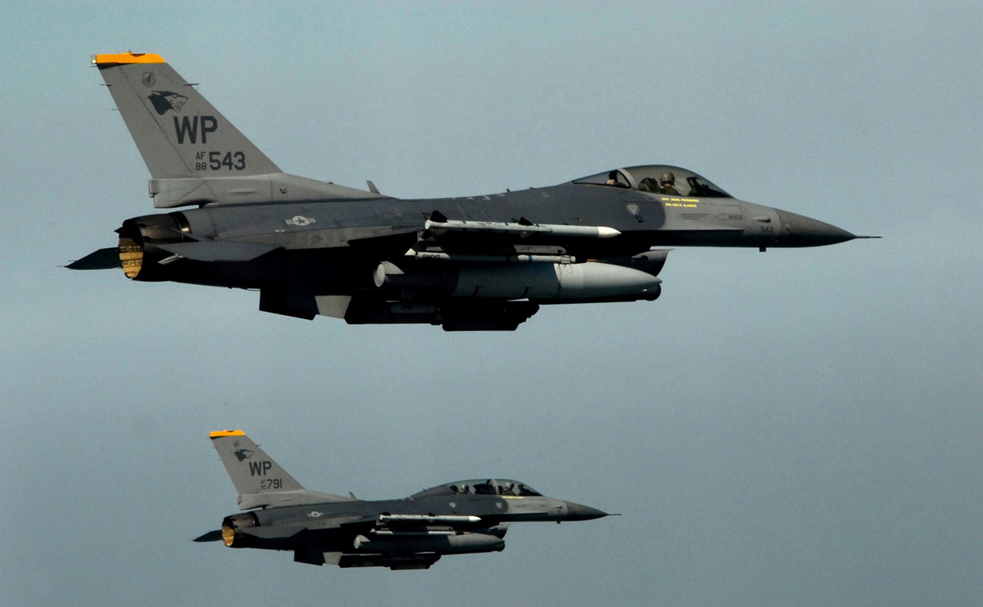 Pilots from the 80th Fighter Squadron fly a training mission over the South Korean peninsula in F-16 Fighting Falcons. Pilots assigned to the 80th FS utilize training missions to simulate actual conditions they may face in combat and keep their war-fighting skills honed. (U.S. Air Force photo/Tech. Sgt. Quinton T. Burris) 