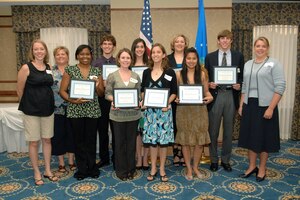 LANGLEY AIR FORCE BASE, Va. -- Military spouses' and high school senior dependents assemble for a group photo during the Langley Officers' Spouses Club 2008 scholarship reception May 28. The LOSC awarded more than $9,000 in scholarships for academic excellence. (U.S. Air Force photo/Senior Airman Vernon Young)