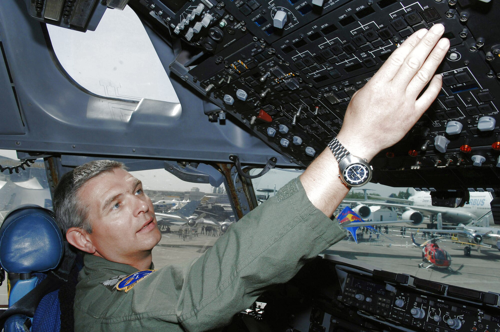 Lt. Col. Marc Beutler, a German air force exchange pilot assigned to the U.S. Air Force, conducts post flight checks on the "Spirit of Berlin" C-17 Globemaster III after performing a flight demonstration at the 2008 Berlin Airshow May 28. Colonel Beutler and the C-17 are assigned to the 437th Airlift Wing at Charleston Air Force Base, S.C. (U.S. Air Force photo/Tech. Sgt. Corey Clements)