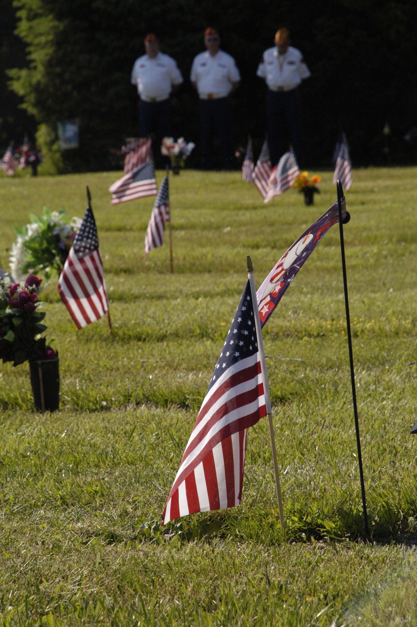 The Central Delaware Detachment of the Marine Corps League and the Dover Air Force Base Honor Guard paid homage to more than 700 military veterans buried at the Sharon Hills Memorial Park in Dover, Del., during the annual Memorial Day service. (U.S. Air Force photo/Airman 1st Class Shen-Chia Chu)