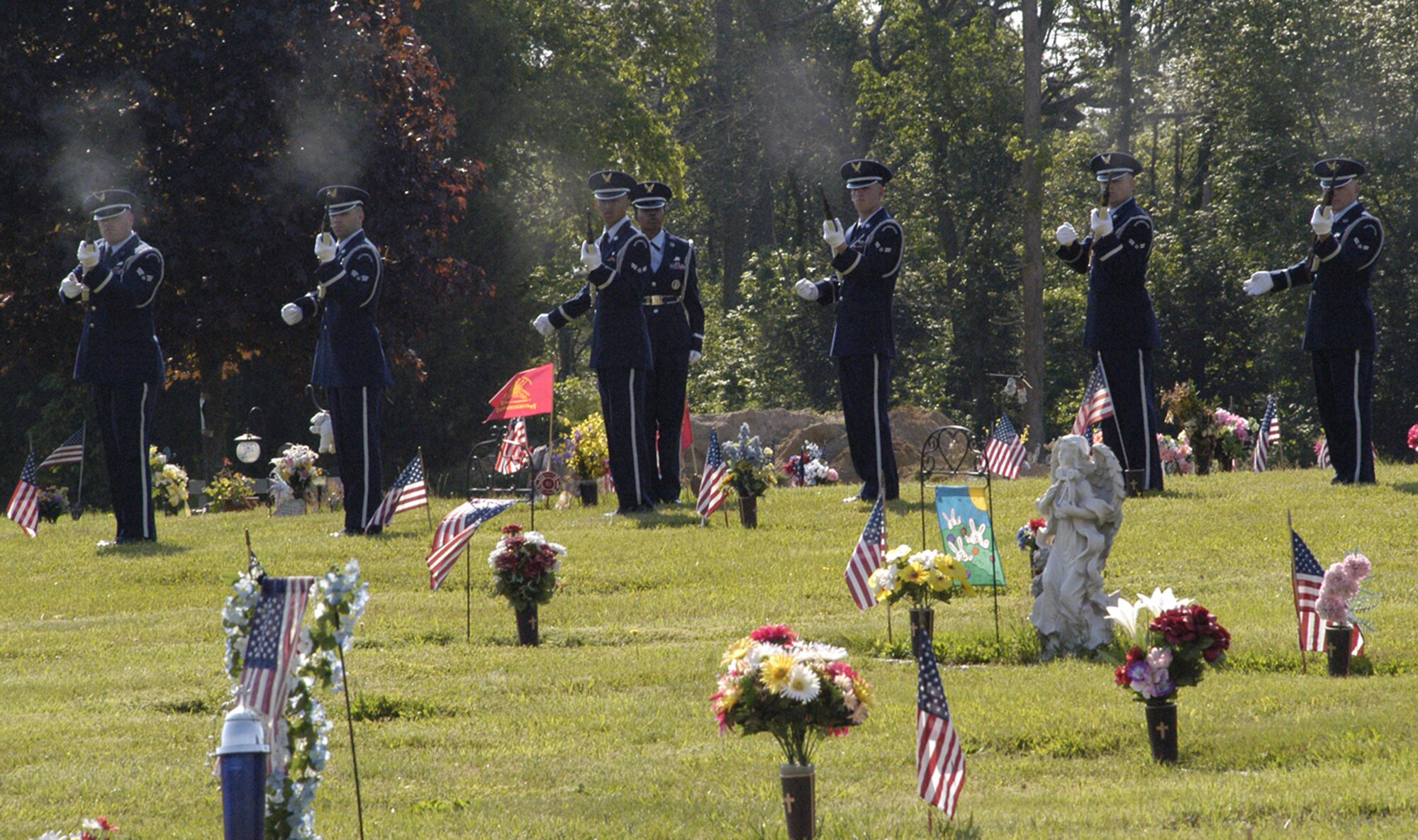 Dover Air Force Base Honor Guard Airmen performed the rifle salute in honor of the fallen servicemembers during the Memorial Day service at Sharon Hills Memorial Park. (U.S. Air Force photo/Airman 1st Class Shen-Chia Chu)