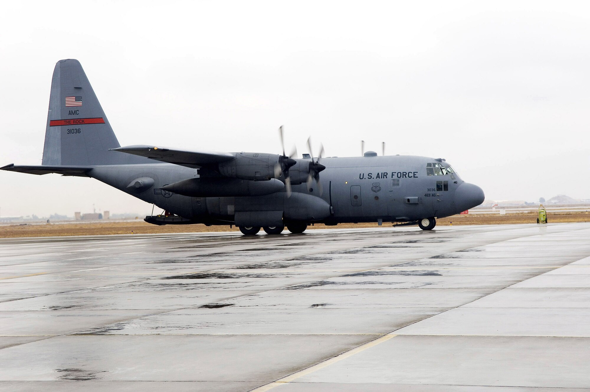 A C-130 Hercules taxis on the runway after the crew picked up military members from a forward operating base in Iraq. (U.S. Air Force photo/Staff Sgt. Travis Edwards) 