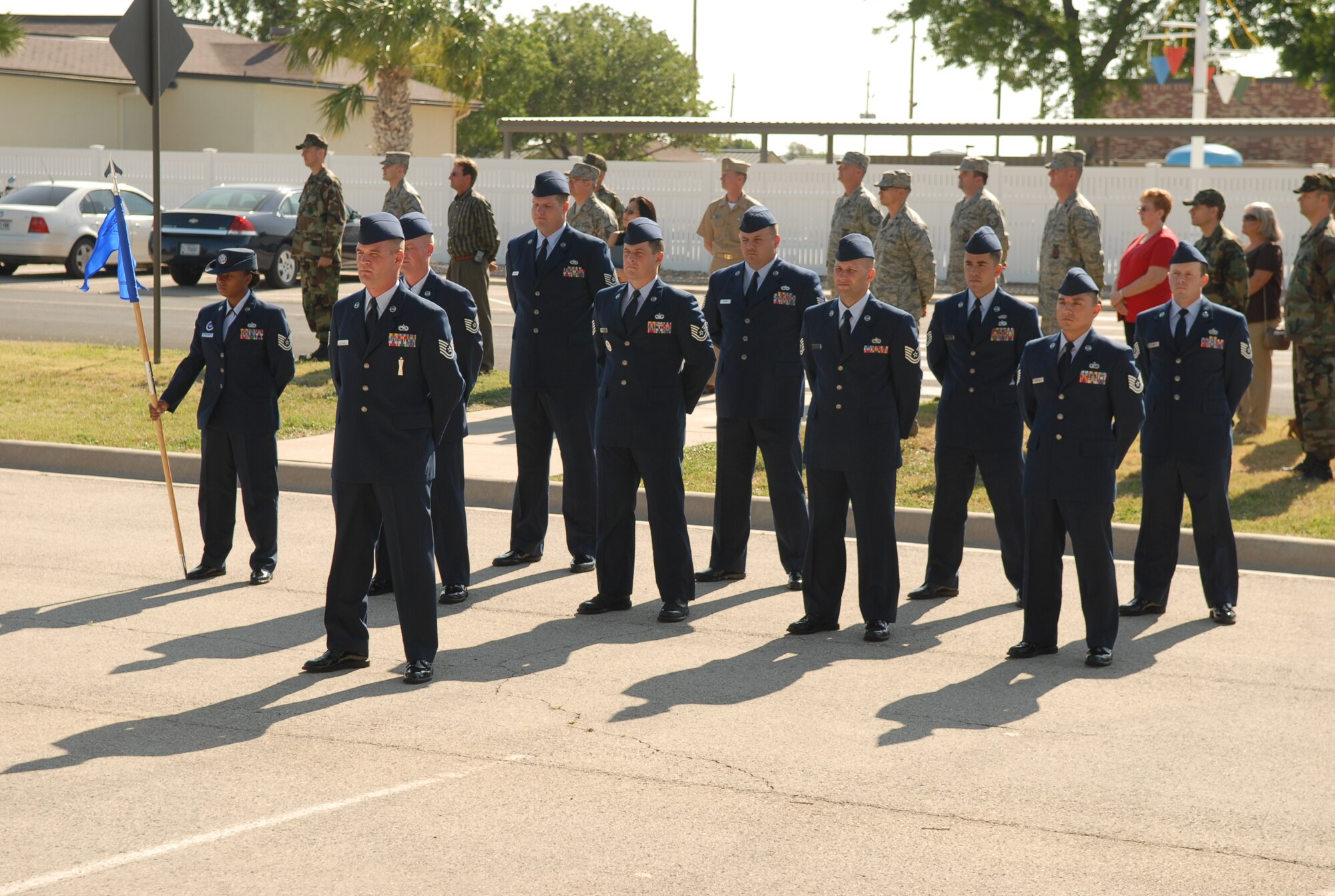 Members of the final class of the Goodfellow Noncommissioned Officers’ Academy stand at parade rest prior to the final retreat ceremony May 28. (U.S. Air Force photo by Staff Sgt. John Barton)
