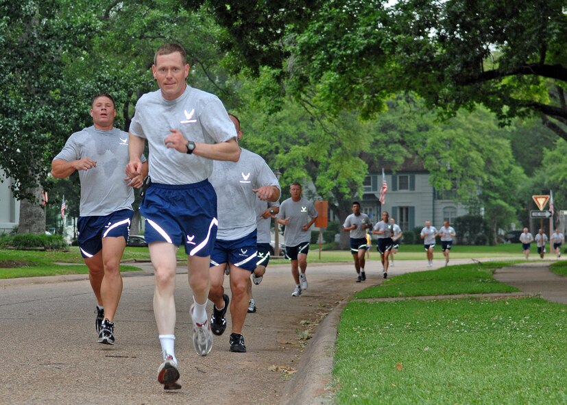 BARKSDALE AIR FORCE BASE, La. - Colonel Robert Wheeler, 2d Bomb Wing commander, runs a 5K through historical housing during a wing sports day held here May 22. (U.S. Air Force photo by Staff Sgt. Trina Jeanjacques)