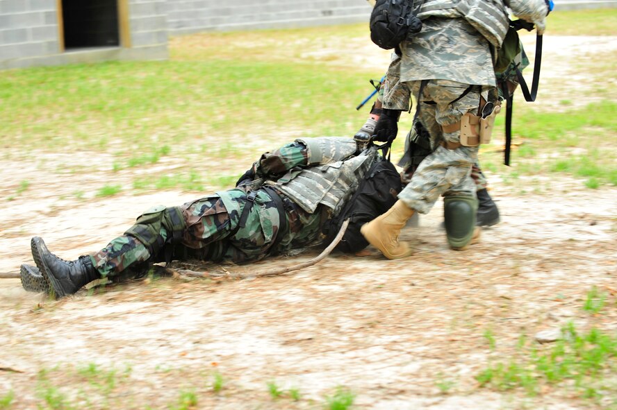 MOODY AIR FORCE BASE, Ga - - During a recent Combat Medical Skills training exercise here May 22, an Airman from the 820th Security Forces Group evacuates a simulated casualty for emergency medical treatment. The 820th SFG uses the medical training to to teach Airmen how to save lives during combat situations. (U.S. Air Force photo by Senior Airman Schelli Jones) 
