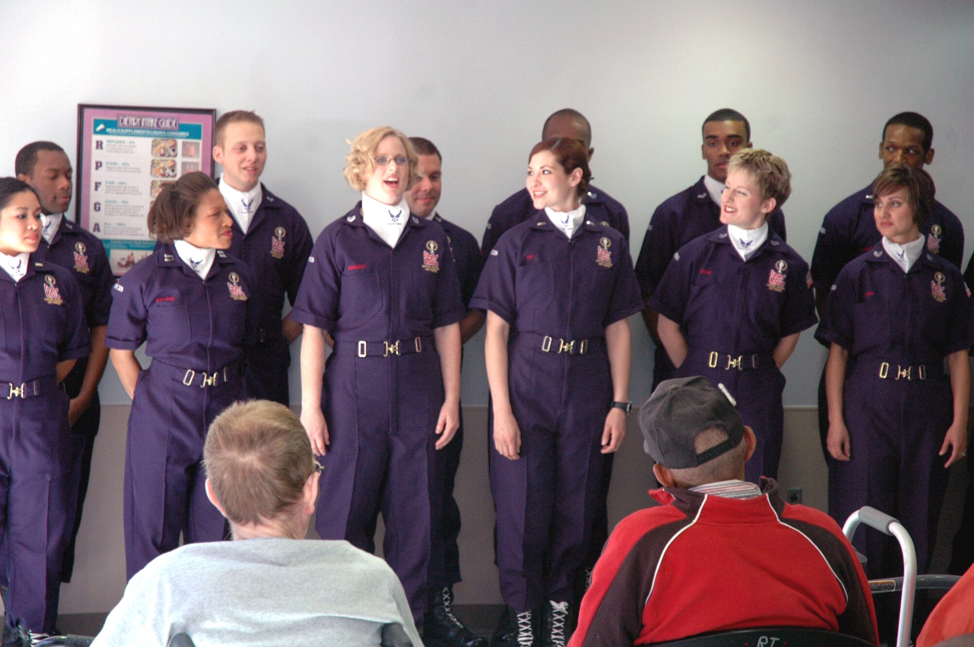 Airmen from the Air Force Services' Tops in Blue of San Antonio, Texas, sing for veterans at the Veterans Affairs Nursing Home care unit in Philadelphia May 29, 2008, as part of activities for Air Force Week in Philadelphia.  (U.S. Air Force Photo/Tech. Sgt. Scott T. Sturkol)