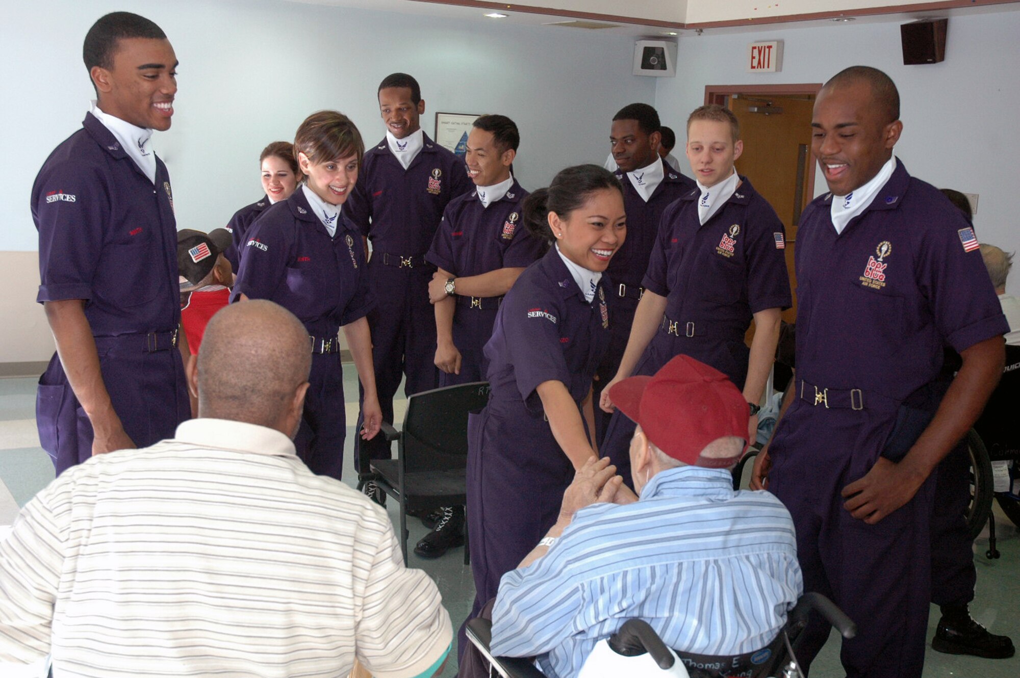 Airmen from the Air Force Services' Tops in Blue of San Antonio, Texas, greet with veterans at the Veterans Affairs Nursing Home care unit in Philadelphia May 29, 2008, prior to performing for them as part of activities for Air Force Week in Philadelphia.  (U.S. Air Force Photo/Tech. Sgt. Scott T. Sturkol)