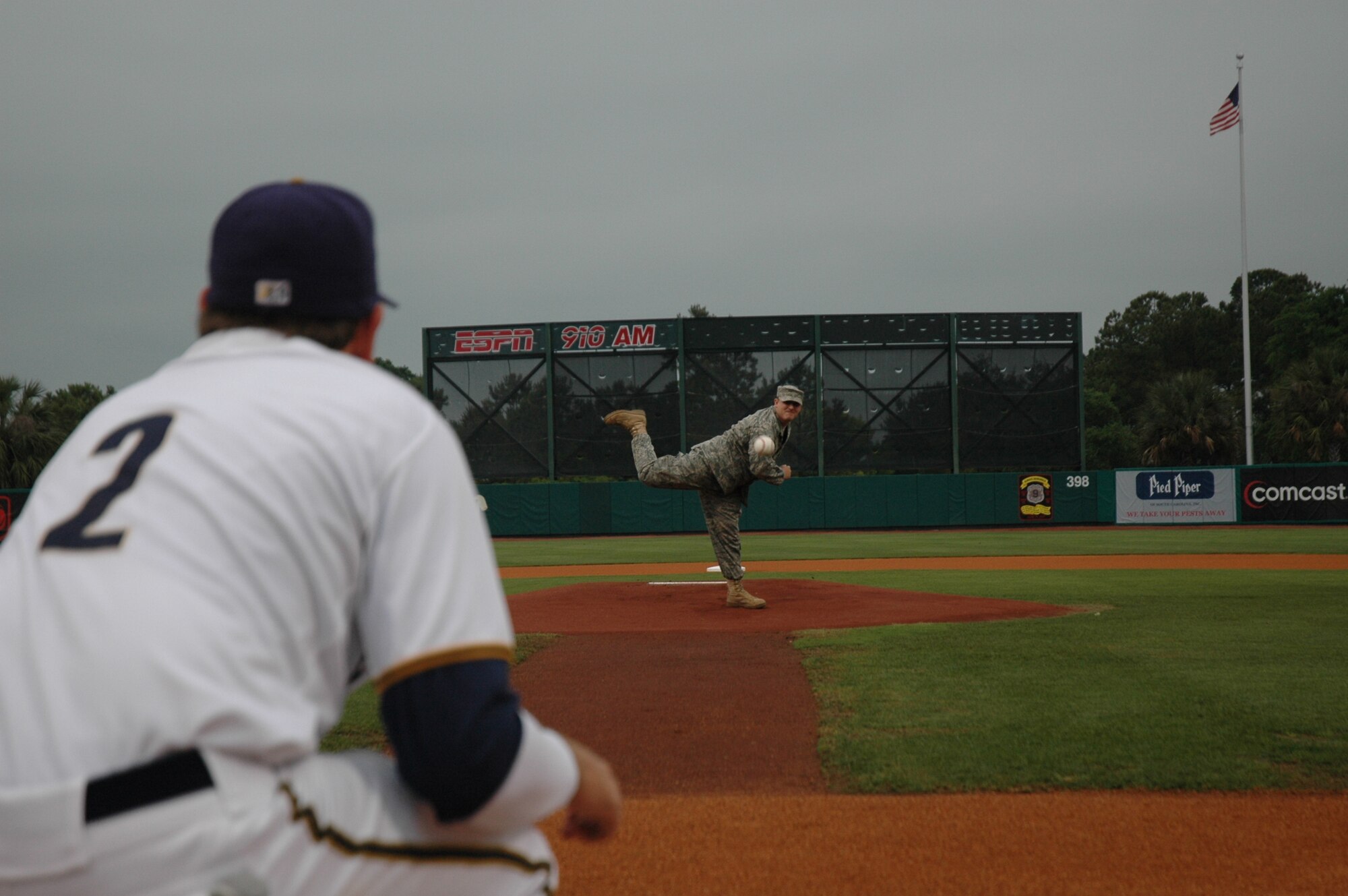 Staff Sgt. Matthew Reese, an explosive ordinance oisposal craftsman with the 315th Civil Engineering Squadron, throws out the first pitch for the Charleston Riverdogs' Military Appreciation Night May 29.  Sergeant Reese recently returned from a deployment to the AOR and was selected as U.S. Air Force Reserve Airman of the Year. (Photo by Capt. Bryan Lewis)
