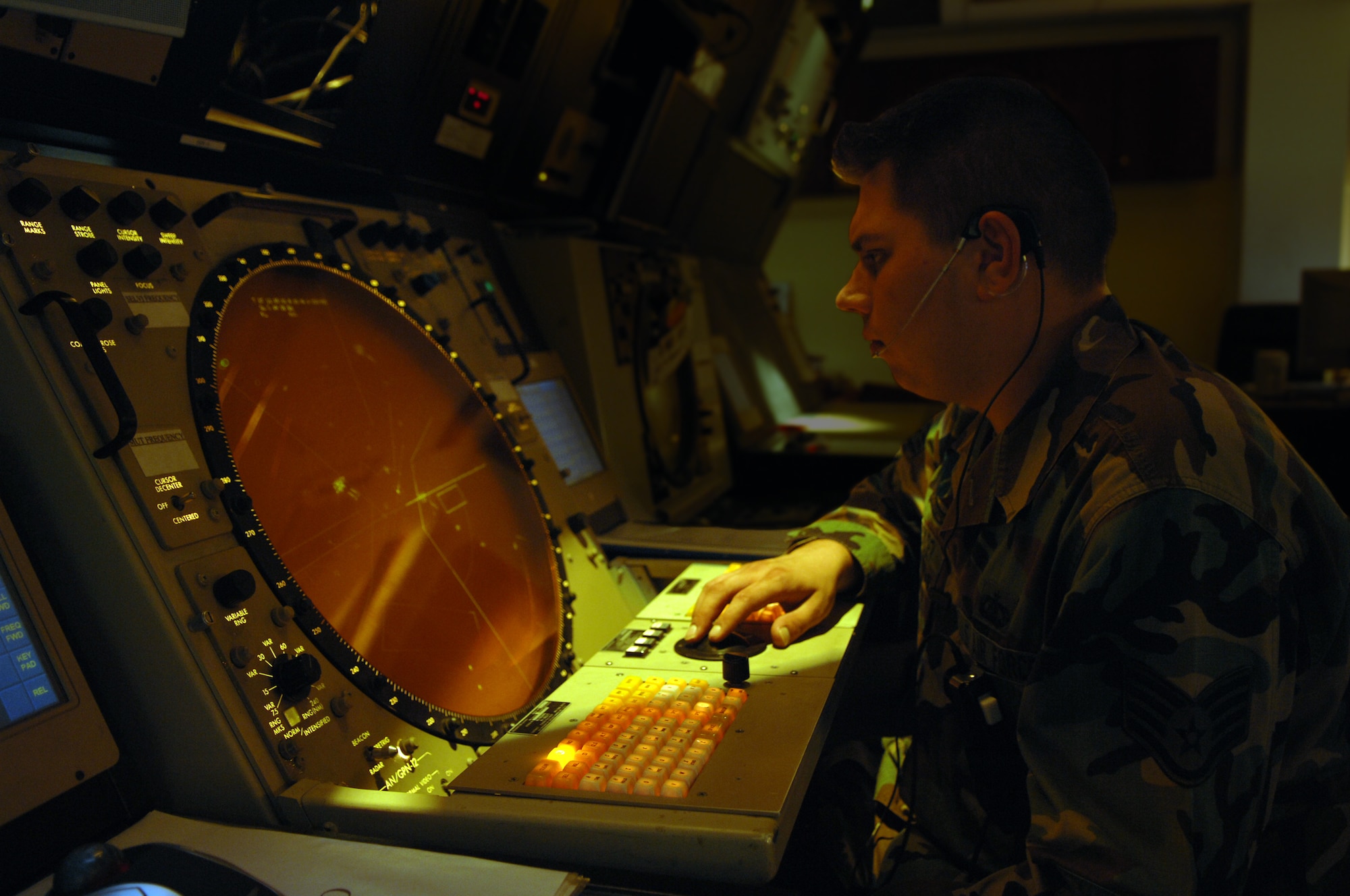 Staff Sgt. Richard Gadek, 39th Operations Squadron Radar Approach Control watch supervisor, monitors a radar screen in the RAPCON May 27. (Photo graphically enhanced by Senior Airman Jason Burton)