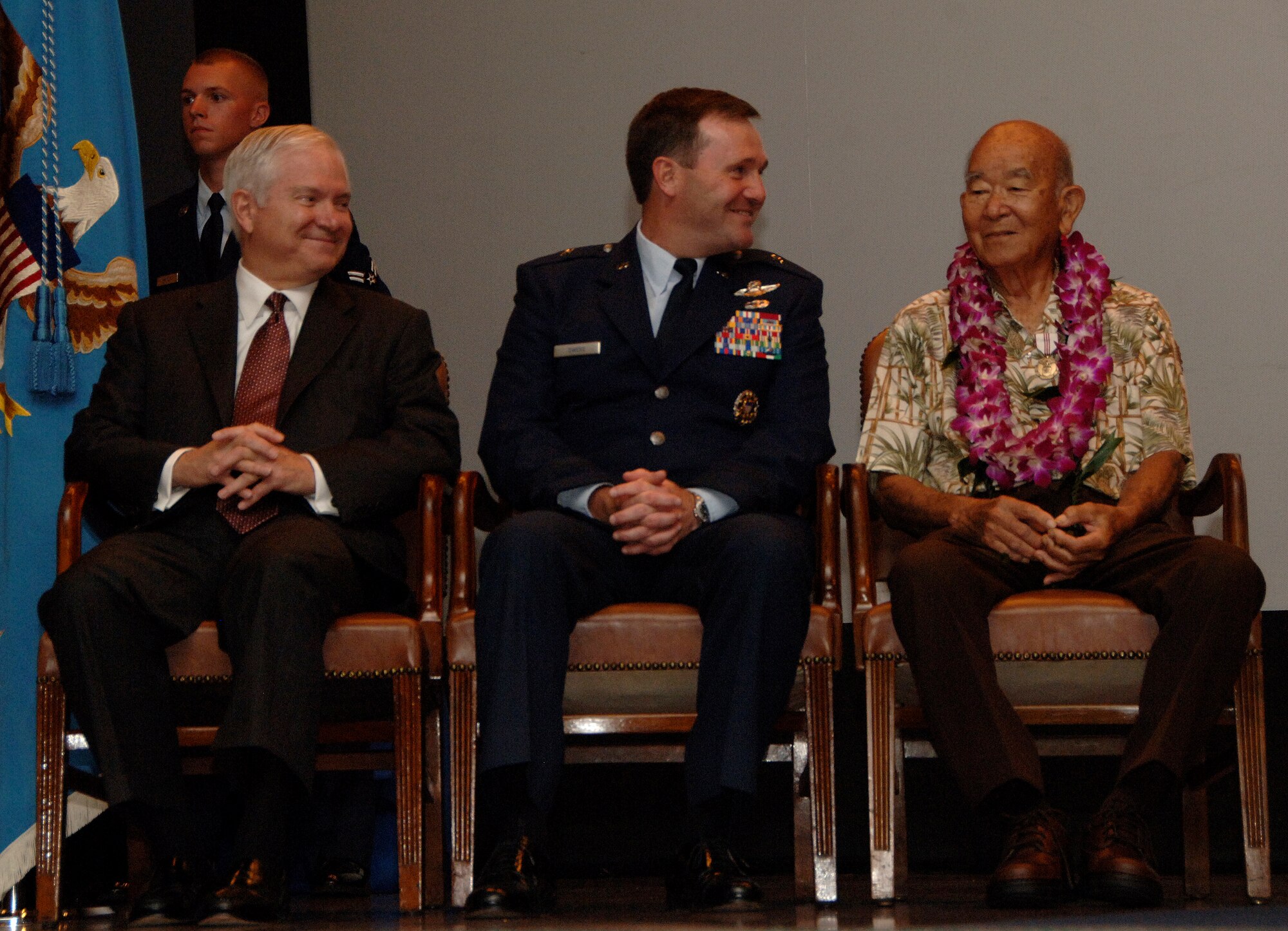 Secretary of Defense Dr. Robert Gates and Brig. Gen. Doug Owens, 36th Wing commander, express their appreciation of Seikichi "Mr. Paul" Kaneshiro for his  dedicated sixty-six years of service to the nation during his retirement ceremony at Andersen Air Force Base on May 30. Dr. Robert Gates presided over the ceremony held in honor of Mr. Paul who has served in both the military and civil service since Jan. 28, 1946. His service includes support to the Cold War, the Korean War and Vietnam War, Operations Desert Shield and Desert Storm and The Global War On Terror.  (U.S. Air Force photo by Airman 1st Class Courtney Witt)   
