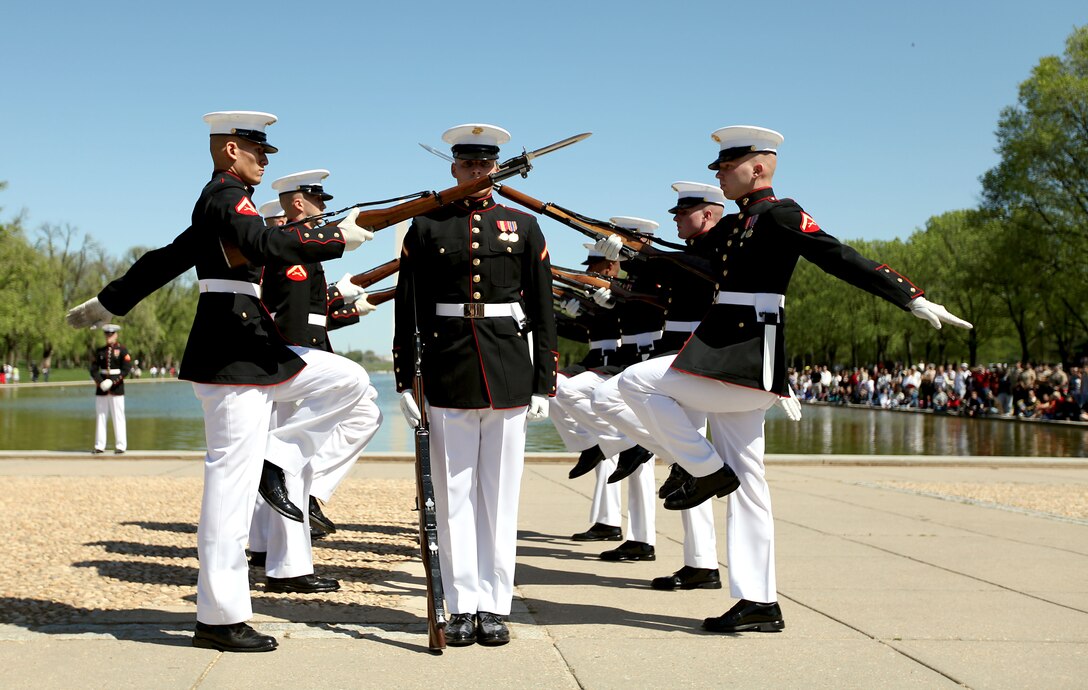 Marines with the Silent Drill Platoon performed at the  U.S. Armed Forces Joint Ceremonial Drill Competition at the Licoln Memorial April 10. The Joint Drill Competition featured ceremonial drill units from each of the armed services.