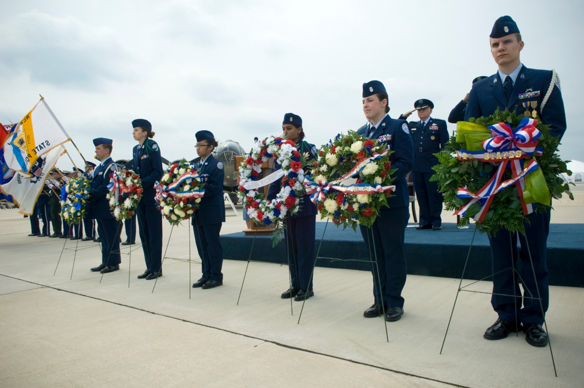 Gen. Arthur J. Lichte salutes for the playing of "Taps" during a wreath laying ceremony honoring fallen military heroes past and present at the opening ceremonies of the 2008 McGuire Air Expo May 31 at McGuire Air Force Base, N.J. Base officials hosted the air expo, which concluded Air Force Week in Philadelphia. General Lichte is the commander of Air Mobility Command from Scott AFB, Ill. (U.S. Air Force photo/Staff Sgt. Bennie J. Davis III)