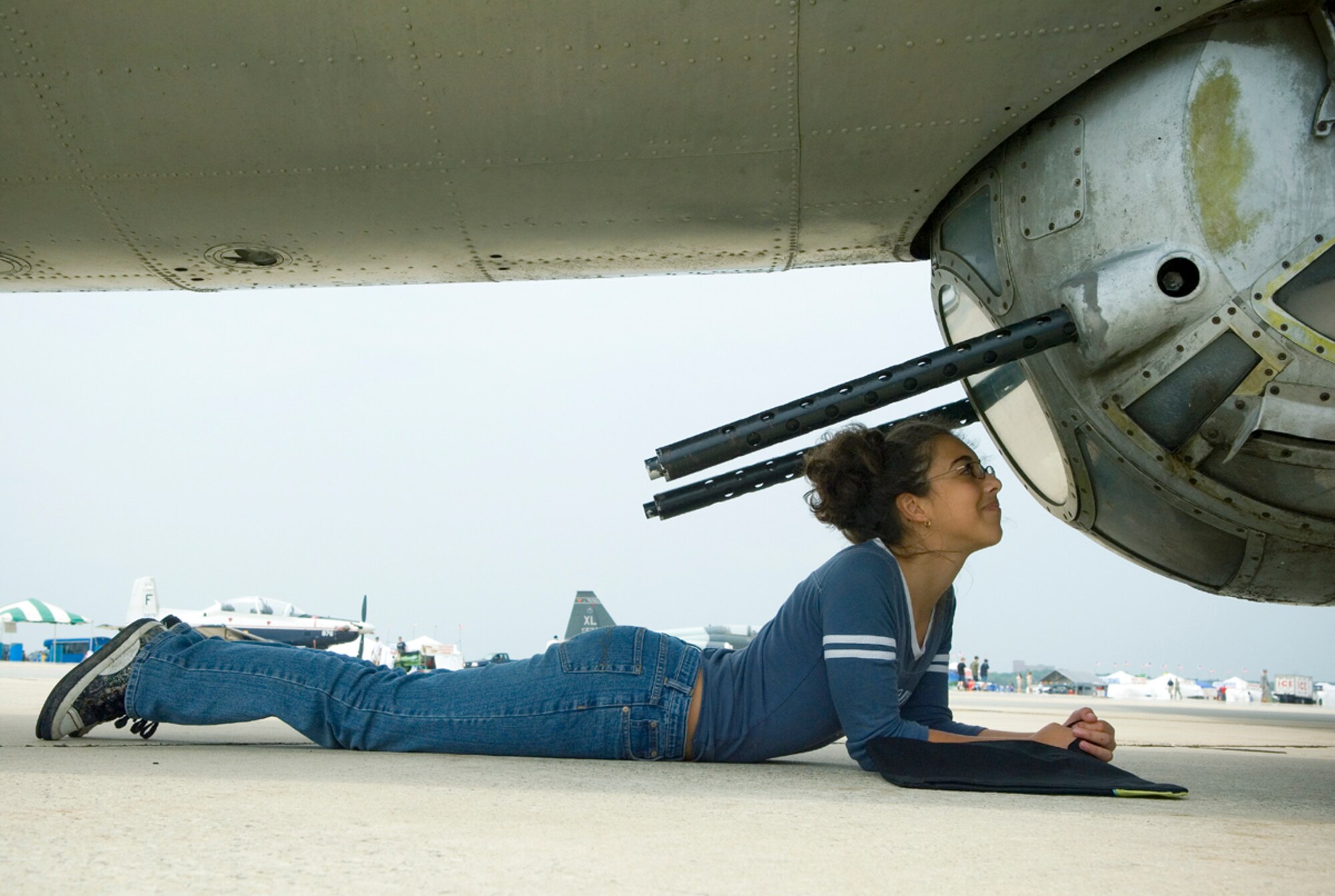 Lexi McGuirk gets a closer look at a B-17 Flying Fortress gun pod at the 2008 McGuire Air Expo May 31 at McGuire Air Force Base, N.J. Base officials hosted the air expo, which concluded Air Force Week in Philadelphia.  Lexi, 11, of Clarks Summit, Pa., came to the airshow with her family to see all the military aircraft. (U.S. Air Force photo/Staff Sgt. Bennie J. Davis III)