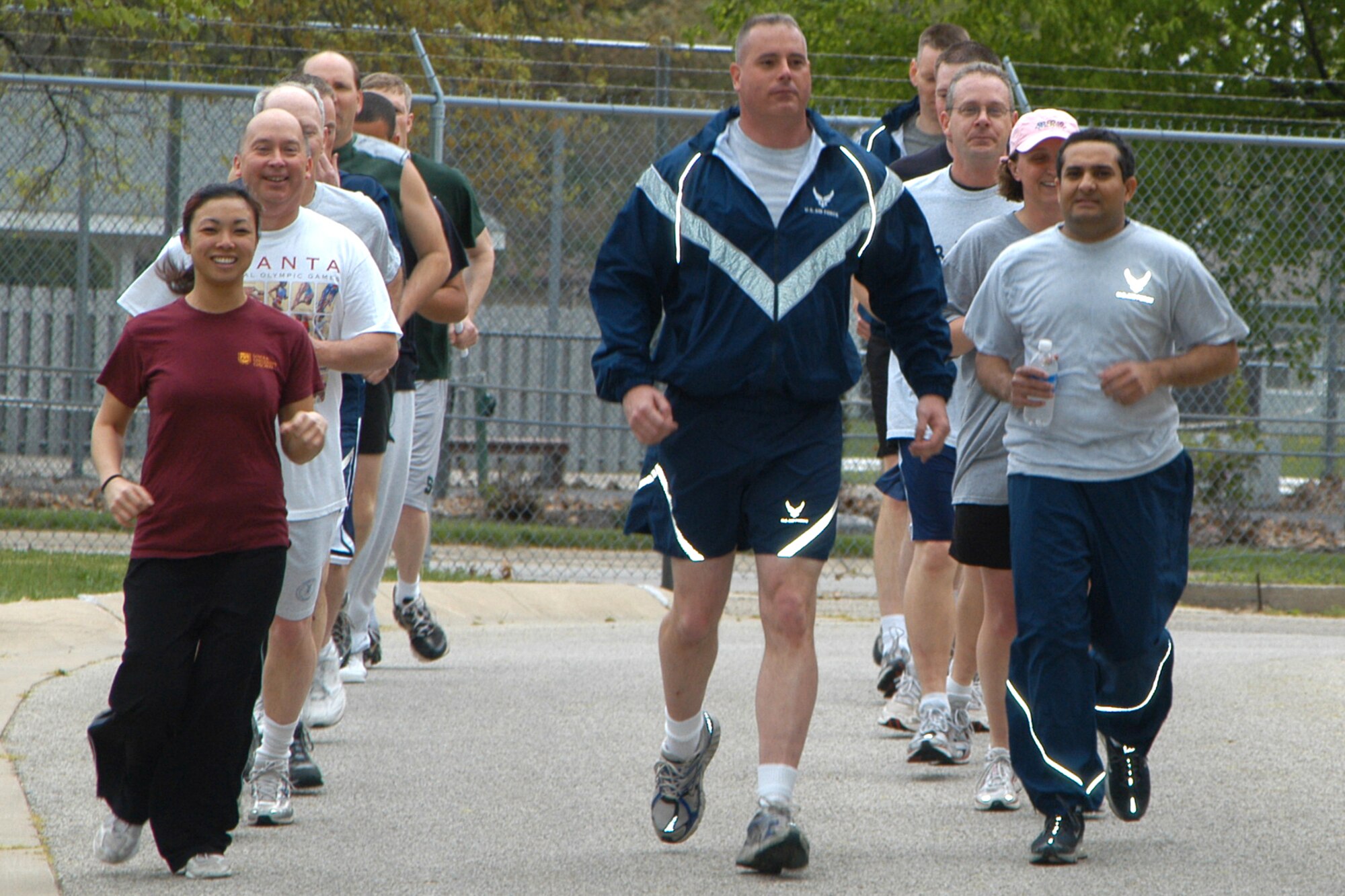 GRISSOM AIR RESERVE BASE, Ind., -- Members of the 434th Communications Squadron participate in a fitness run.  Exercise and fitness have become a routine part of their unit training assembly schedule. (Air Force photo / Senior Airman Ben Mota)
