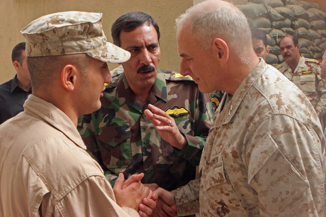 Maj. Gen. John F. Kelly, commanding general, Multi National Forces-West, speaks to Iraqi Brig. Gen. Nour al Din, the chief intelligence official in Al Anbar after a meeting aboard Camp Habbaniyah May 31. Maj. Gen. Kelly facilitated the meeting between high ranking officials in the Iraqi Army and Iraqi Police and members of the Brookings Institution and Harvard University.