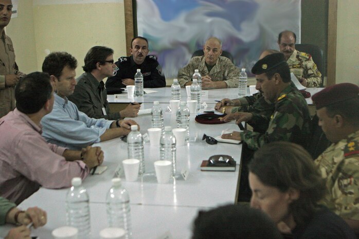 Maj. Gen. John F. Kelly, commanding general, Multi National Forces-West, speaks with members of the Brookings Institution, Harvard University and high ranking officials in the Iraqi Army and Iraqi Police during a meeting at Camp Habbaniyah May 31. The meeting was scheduled to give these "thinkers" a chance to speak to Iraqi officials in-person to assess the eventual transition of authority from the Coalition Forces to the Iraqi Security Forces in the Al Anbar province of Iraq.