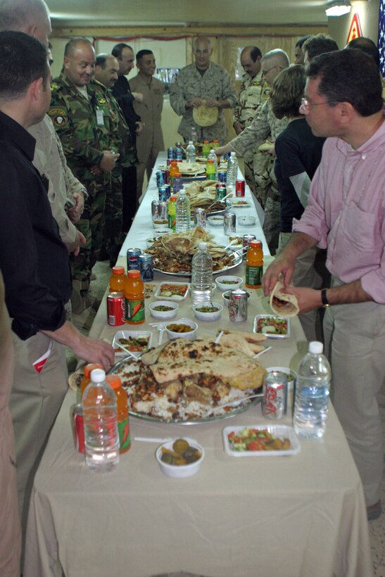 Maj. Gen. John F. Kelly (center), commanding general, Multi National Forces-West, prepares to eat a working-lunch with high ranking officials in the Iraqi Army and Iraqi Police as well as members of the Brookings Institution and Harvard University during a meeting on Camp Habbaniyah May 31.