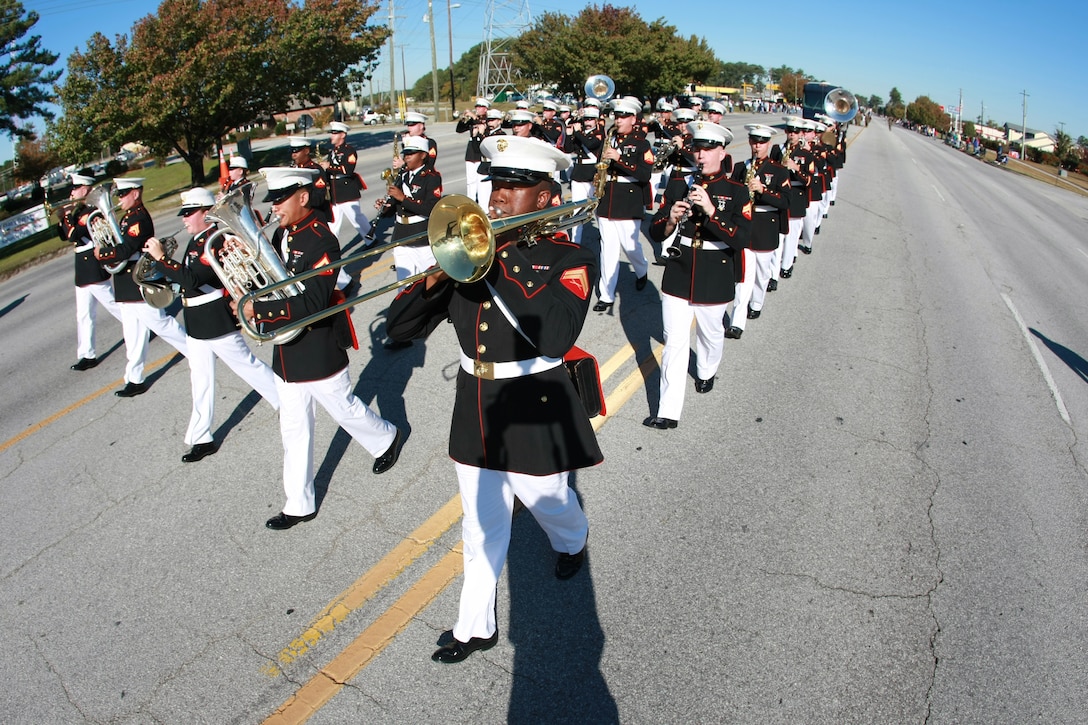 The 2nd Marine Division band, marches down the street during Onslow County’s 13th annual Veterans Day parade held Saturday on Western Boulevard. More than 1,000 participants and at least 5,000 patriotic spectators turned out despite the chilly temperature.