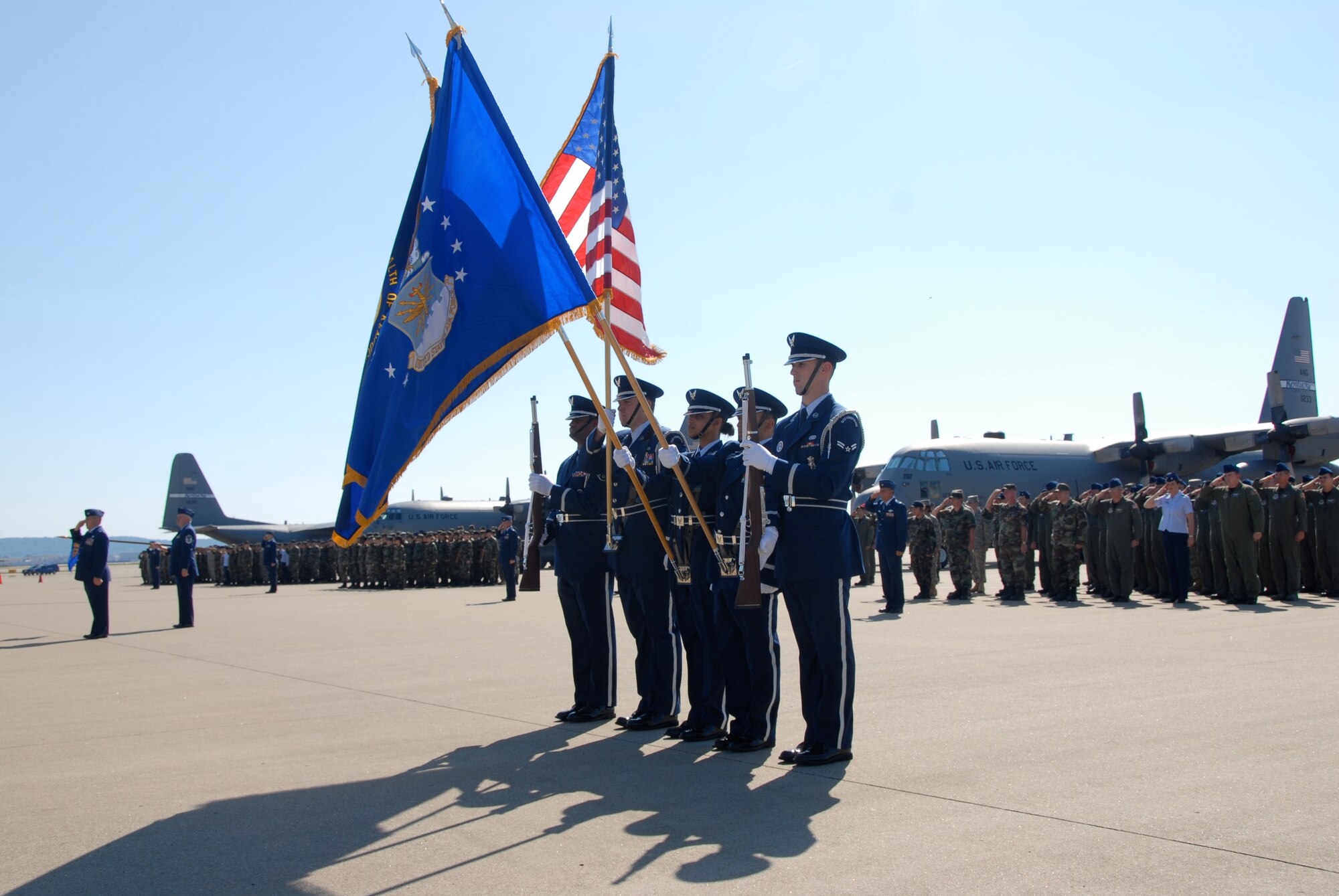 The Base Color Guard opens the change-of-command ceremony as the wing stands at attention on the KyANG flightline. (Photo by Tech. Sgt. Dennis Flora, Kentucky Air National Guard.)