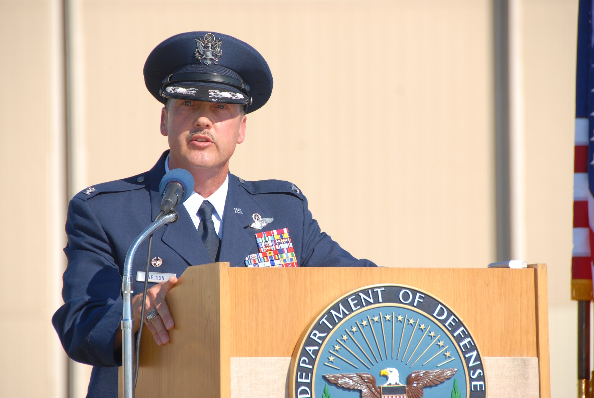 Col. Greg Nelson addresses members of the 123rd Airlift Wing after taking command of the unit Oct. 5. He began his career as an enlisted Airman and has served for more than three decades. (Photo by Tech. Sgt. Dennis Flora, Kentucky Air National Guard.)