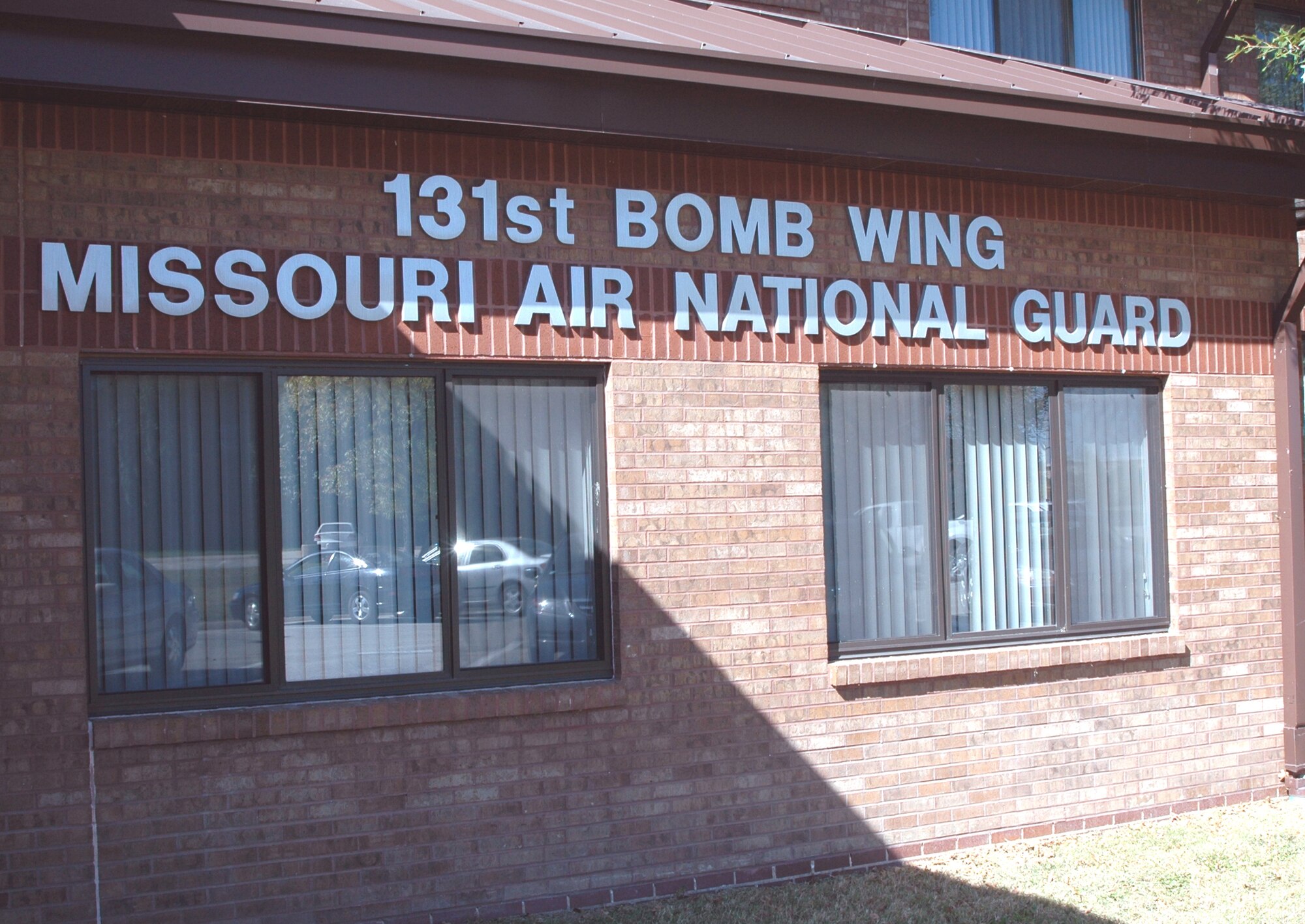 A ribbon cutting ceremony celebrated the first official drill for traditional guardsmen at Whiteman Air Force Base and recognized the grand opening of building 3006, 131st Bomb Wing headquarters. (Photo by Master Sgt. Mary-Dale Amison)