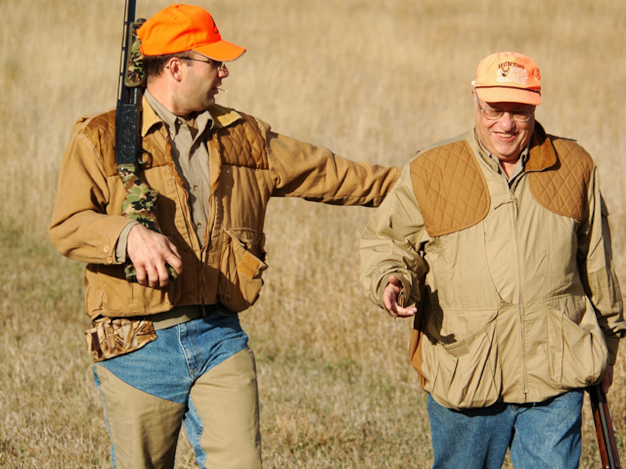 Sgt. 1st Class Scott Horst, of the 141st Maneuver Enhancement Brigade, pats Tweed Roosevelt on the shoulder during a moment of fellowship while pheasant hunting.
