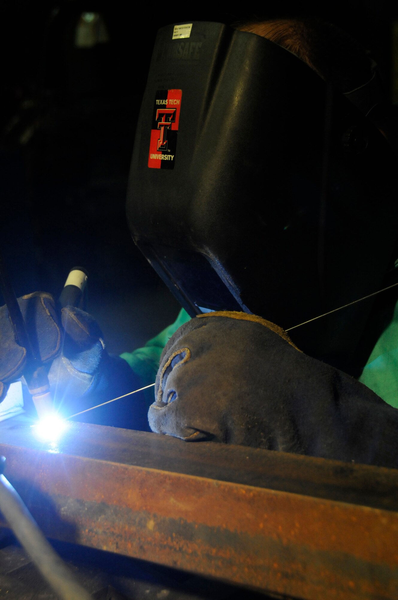 Staff Sgt. James McCutcheon, aircraft metals technology craftsman assigned to the 379th Expeditionary Maintenance Squadron, repairs a cracked axle with a tungsten inert gas welder Oct. 31, 2008, at an undisclosed air base in Southwest Asia. The 379th EMXS performs the majority of back-shop repair for assigned aircraft, allowing them to continue to fly and carry out the Global War on Terrorism. Sergeant McCutcheon, a native of Lubbock, Texas, is deployed from McGuire Air Force Base, N.J., in support of Operations Iraqi and Enduring Freedom and Joint Task Force-Horn of Africa. (U.S. Air Force photo by Staff Sgt. Darnell T. Cannady/Released)