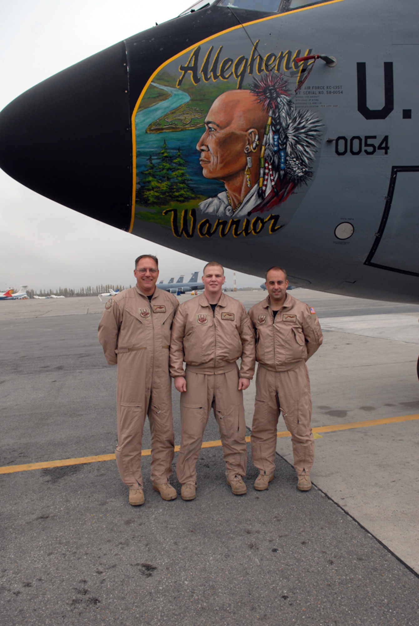 MANAS AIR BASE, KYRGYZSTAN -- Lt. Col. Jorg Kaltenegger, Tech. Sgt. Kelman Khersonsky and Maj. Scott Rushe are all smiles after completing one of their last refueling missions in support of operations in Afghanistan the morning of Oct. 29. The three were among more than 100 Pennsylvania Air National Guardsmen deployed here from Pittsburgh's 171st Air Refueling Wing. For Sergeant Khersonsky, the month-long deployment was extra special; his daily routine as a KC-135 boom operator took him within sight of his childhood home of Tashkent, Uzbekistan. (Air Force photo / Senior Airman Ruth Holcomb) 