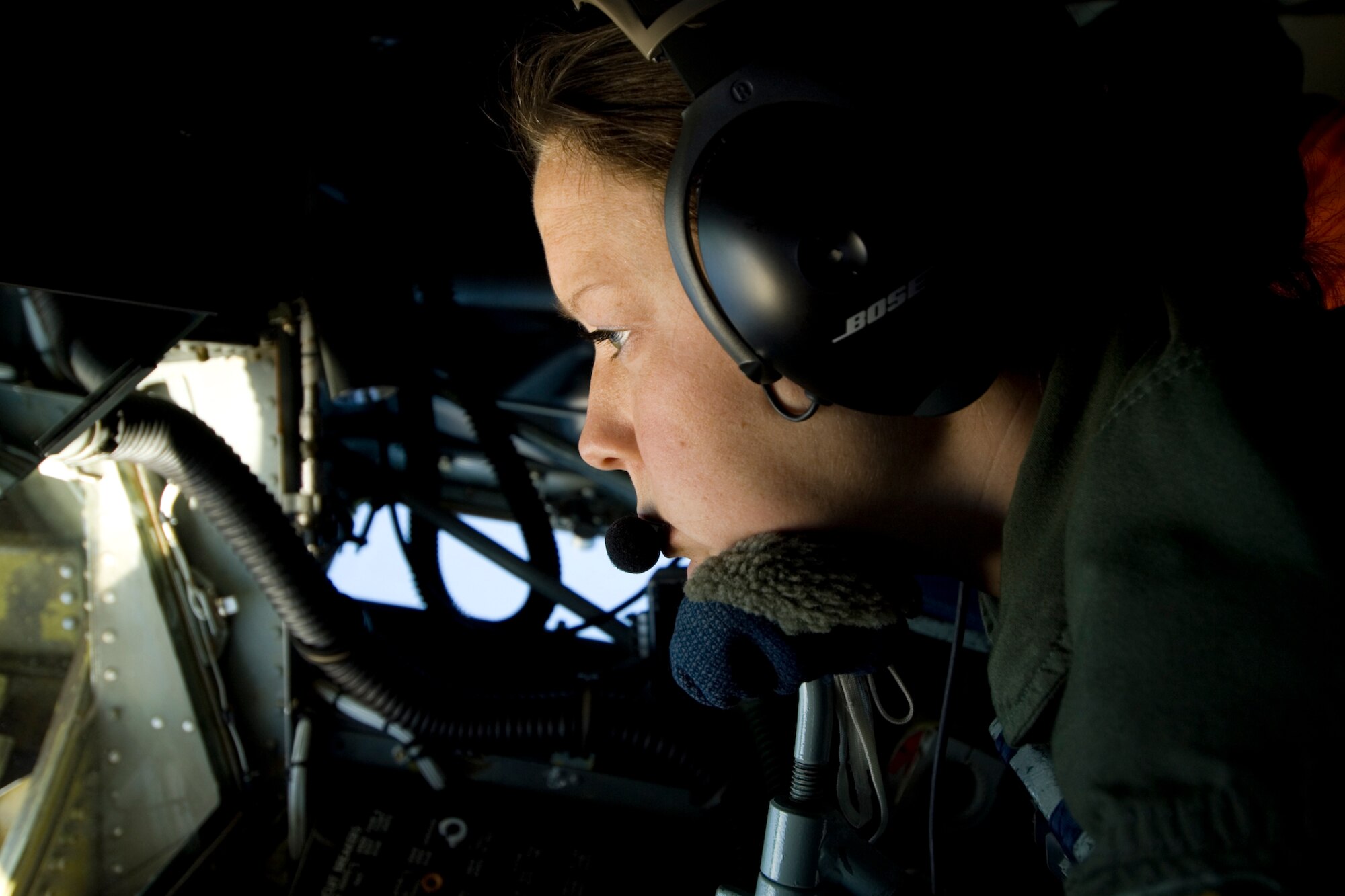 Senior Airman Misty Bice, boom operator for the 171st Air Refueling Squadron, Selfridge ANGB, Mich., refuels a 1st Fighter Wing F-22 Raptor flying out of Langley AFB, Va. This historic occasion marked the first time for many 127th Wing airmen to see the newest fighter in the Air Force fleet. (U.S. Air Force Photo by Senior Airman Jeremy L. Brownfield) (Released)