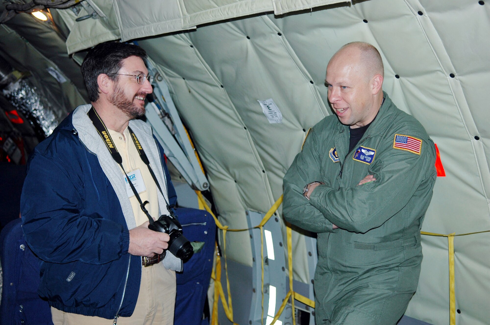 Tech. Sgt. Clay Dotson, a boom operator from McConnell Air Force Base, Kan., and Jim Dean of Android Industries talk about the Air Force Reserve aboard a KC-135 aircraft during the 917th Wing Employer Appreciation Day event held Nov. 1 at Barksdale Air Force Base, La.  Fourteen employers of Barksdale reservists participated in a refueling mission involving the A-10 and B-52 aircrafts, as well as received an inside look at the 917th and Reserve missions. (U.S. Air Force Photo/Master Sgt. Mary Hinson)