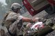 A rodeo participant secures a simulated casualty for evacuation.
(Photo by Master Sgt. Gerold O. Gamble, ANG-RC)