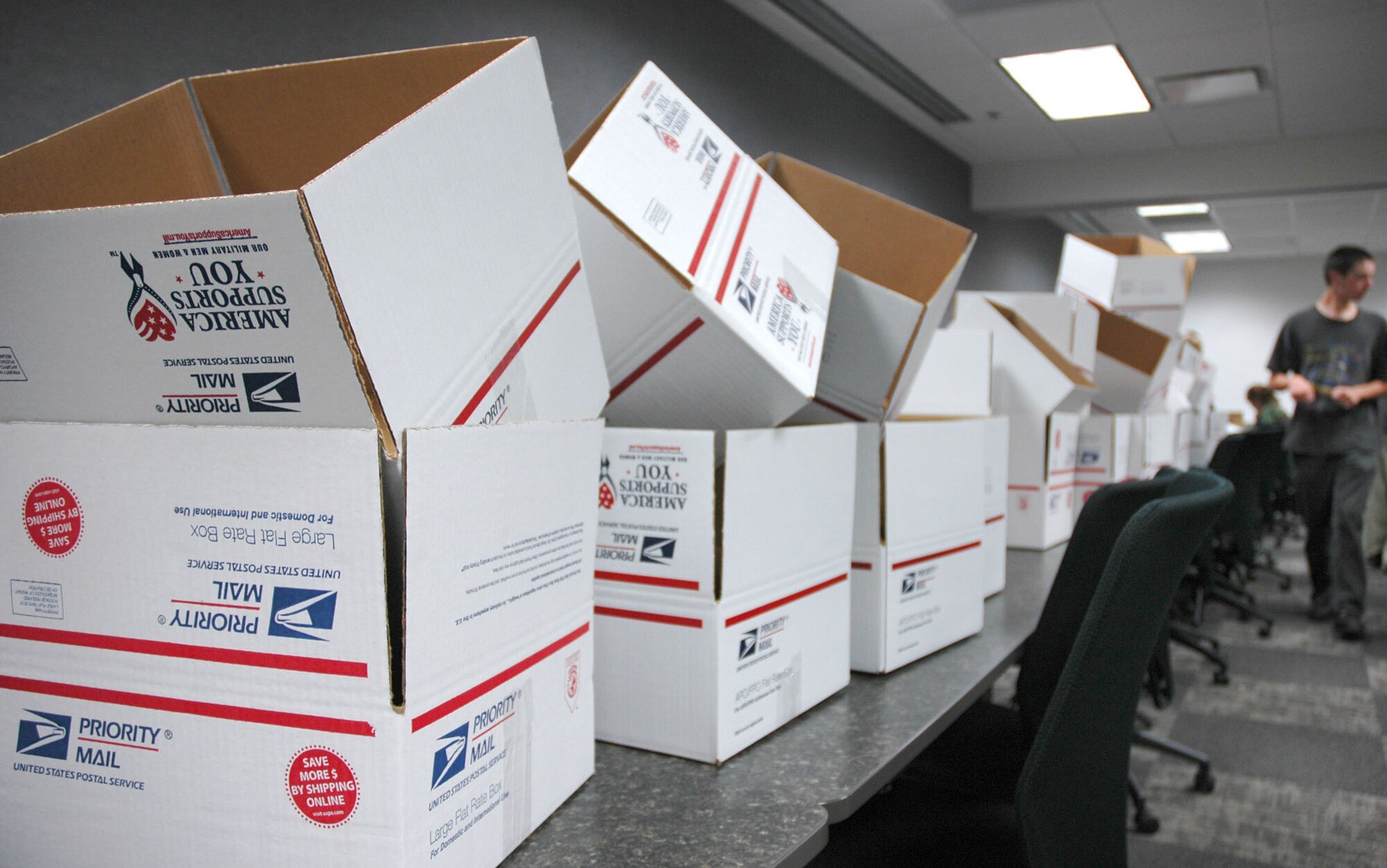 Boxes lie in wait for assorted deployment comfort items Nov. 1 during the Key Family Member Program's deployment care package drive at the 39th Aerial Port Squadron at Peterson Air Force Base, Colo. The packages were assembled by volunteers for members of the 302nd Airlift Wing deployed throughout Southwest Asia. (U.S. Air Force photo/Senior Airman Stephen Collier)