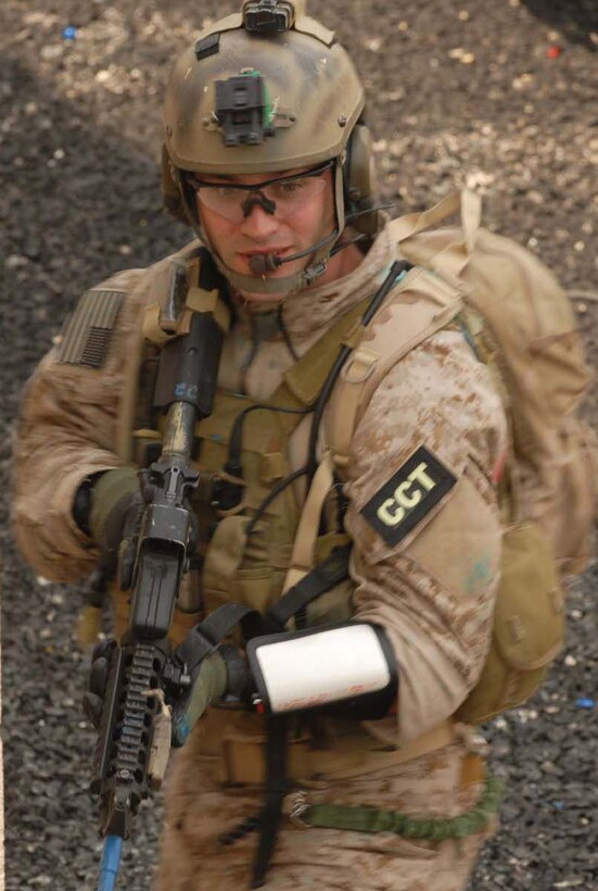 A combat controller patrols for simulated enemy combatants during MOUT.
(Photo by Tech. Sgt. Phil Speck, Kentucky Air National Guard)