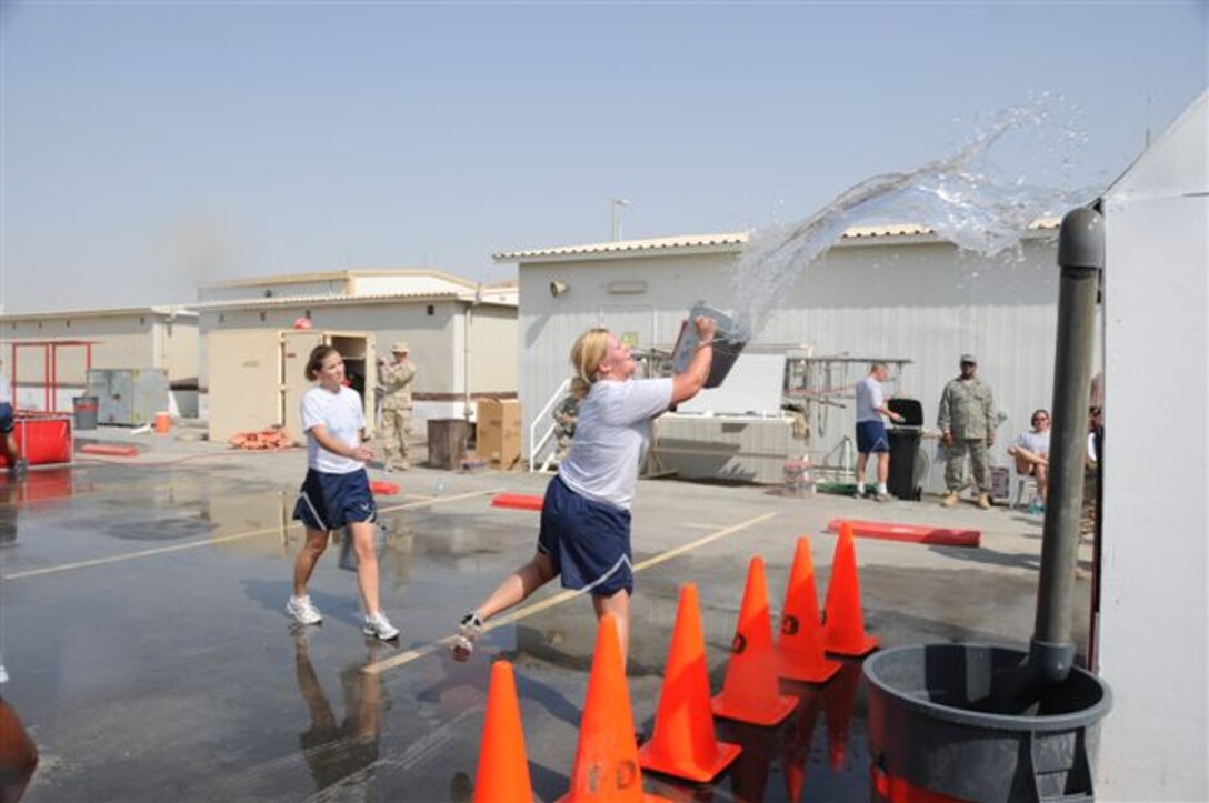 Tech.Sgt. Jodi Renschler and Senior Airman Mandy Herrmann of the 119th Wing participates in a First Master competion while deployed on Oct. 1.