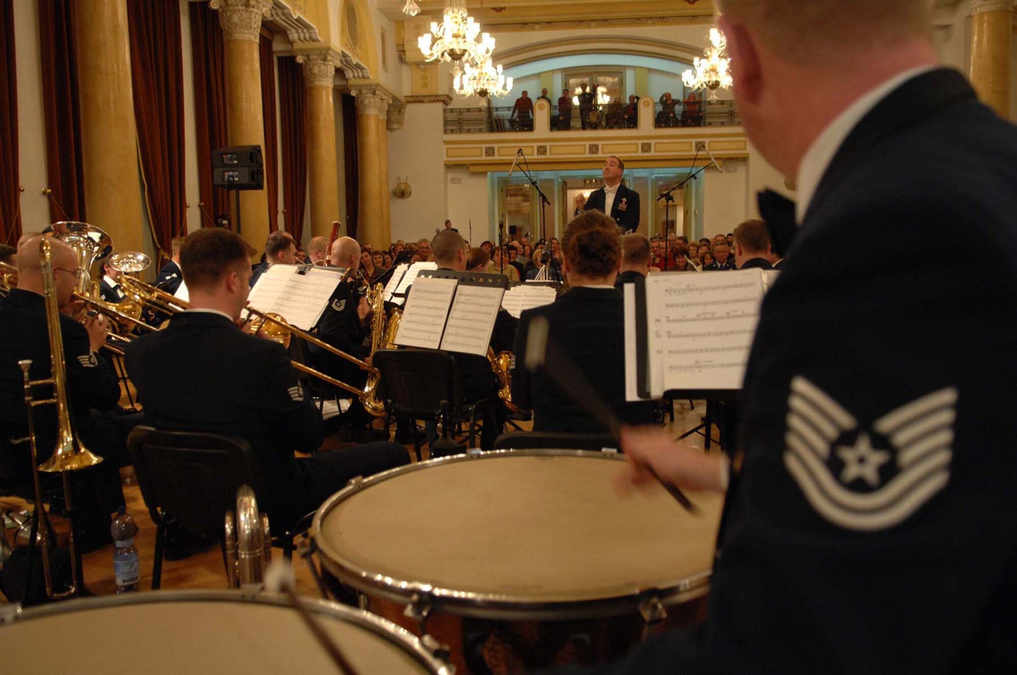 Tech. Sgt. Jim Bartelt (right), percussionist and facility manager, performs during a concert at the Military Club in Brasov, Romania, Oct. 31, 2008. The USAFE Concert Band has been entertaining audiences of all ages and nationalities throughout Europe and Southwest Asia since 1944. (U.S. Air Force by Senior Airman Amber Bressler)