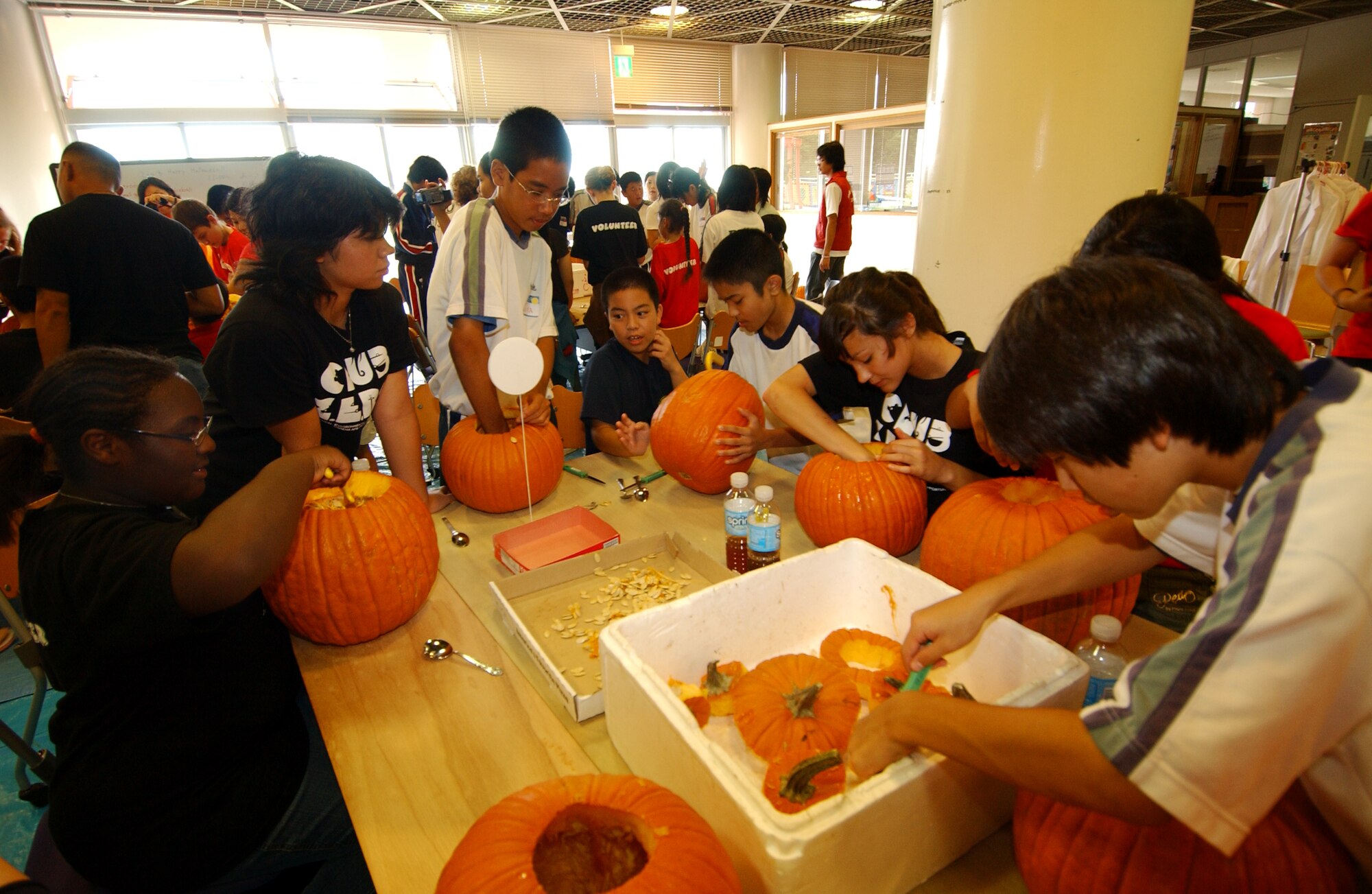 Members of Kadena's Club Zero participated in a cultural exchange with students from a Japanese school November 2, 2008 at the Okinawa Zoo. The students participated in various activities such as games and carving pumpkins during Pumpkin Palooza. (U.S. Air Force photo/Tech. Sgt. Rey Ramon)       