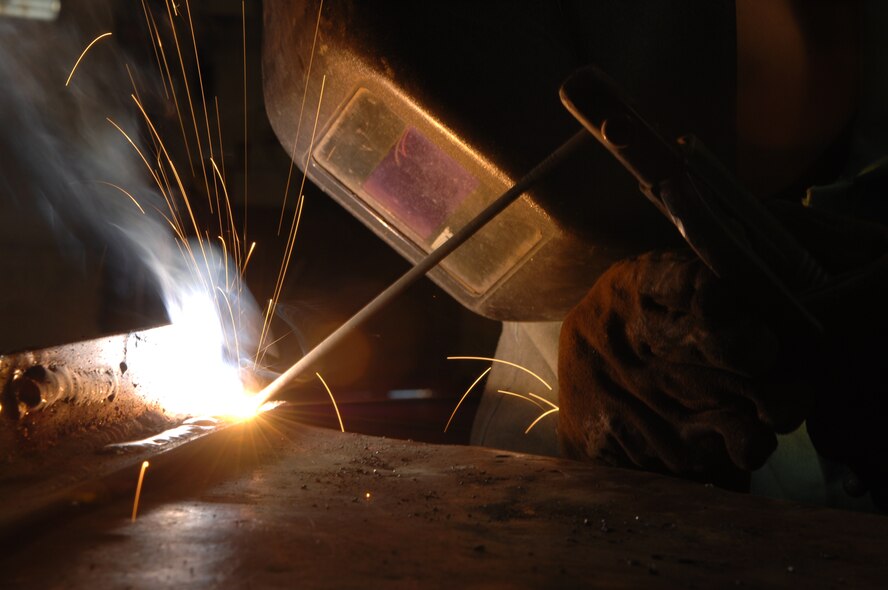 Senior Airman Benjamin Waradzin, 28th Maintenance Squadron metals technician journeyman, practices welding a T-joint here, Nov. 3. Metals technicians fabricate metal parts for various projects, including aircraft ground equipment and torque wrench test plates. (U.S. Air Force photo/Airman 1st Class Joshua J. Seybert)