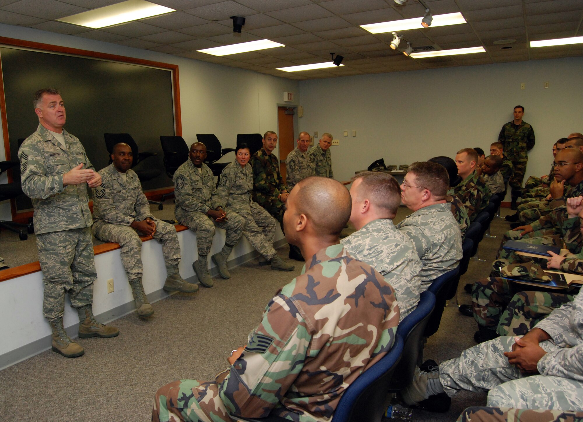 DOVER AIR FORCE BASE, Del. -- Command Chief Master Sgt. Troy McIntosh, Air Force Reserve Command command chief, speaks to a group of approximately 100 512th Airlift Wing Airmen at a chief's panel. The open question and answer forum was part of the wing's first-ever Airman's Weekend held during the November 2008 Unit Training Assembly here. (U.S. Air Force photo/Staff Sgt. Steve Lewis)
