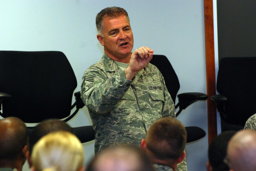 DOVER AIR FORCE BASE, Del. -- Command Chief Master Sgt. Troy McIntosh, Air Force Reserve Command command chief, speaks to a group of approximately 100 512th Airlift Wing Airmen at a chief's panel. The open question and answer forum was part of the wing's first-ever Airman's Weekend held during the November 2008 Unit Training Assembly here. (U.S. Air Force photo/Staff Sgt. Steve Lewis)