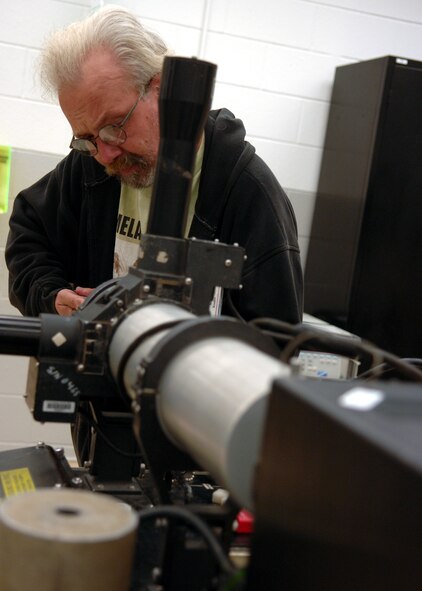 MOODY AIR FORCE BASE, Ga. – Mike Kondort, Precision Measurement Equipment Laboratory technician, tightens screws on a missile guidance test set here Oct.30. Mr. Kondort is in the process of prepping the missile guidance test set for a guidance missile chip. (U.S. Air Force photo by Airman Joshua Green) 