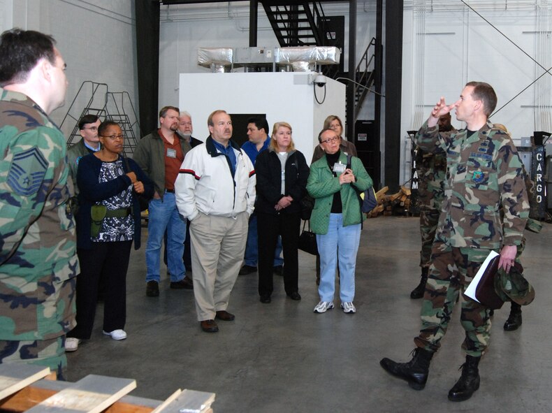 DOVER AIR FORCE BASE, Del. -- Lt. Col. Gregory Murray, 46th Aerial Port Squadron commander, briefs employers about aerial port operations here during Employer Appreciation Day Nov. 1. The event, cosponsored by the Delaware Committee of the Employer Support of the Guard and Reserve, is designed to give employers a taste of what it?s like to be a Citizen Airman. The employers also received a military working dog demonstration and concluded the day with a C-17 Globemaster III flight. (U.S. Air Force photo/Staff Sgt. Steve Lewis) 