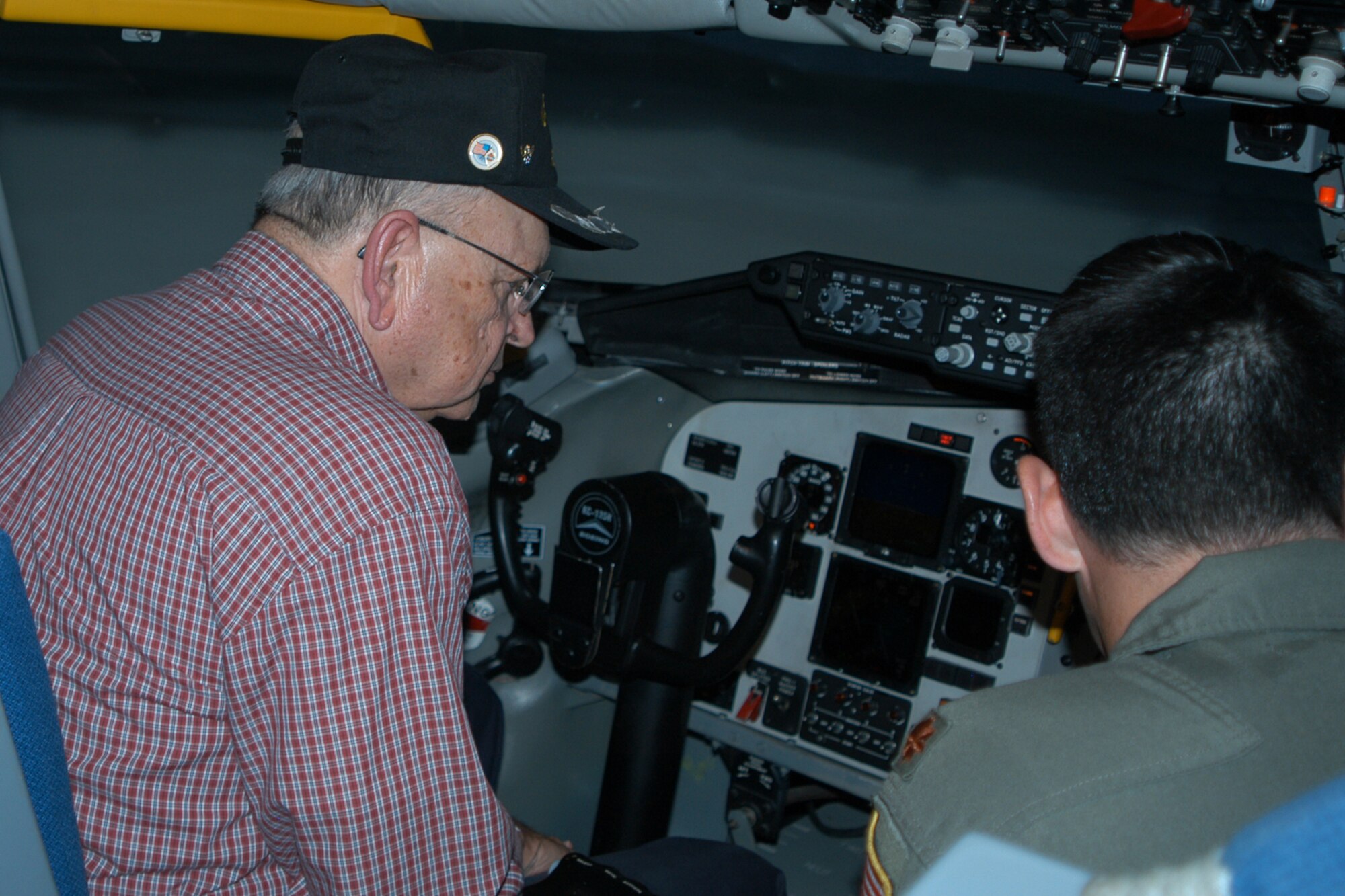 GRISSOM AIR RESERVE BASE, Ind., -- Clifford Hunt listens closely as Maj. Erik Aufderheide, 72nd Air Refueling Squadron, gives him a briefing before he can  test his skills in the KC-135R flight simulator Nov. 1. Mr. Hunt joined more than 35 other Grissom Community Council members who toured the base. (U.S. Air Force photo/Capt. Kelly Howard)