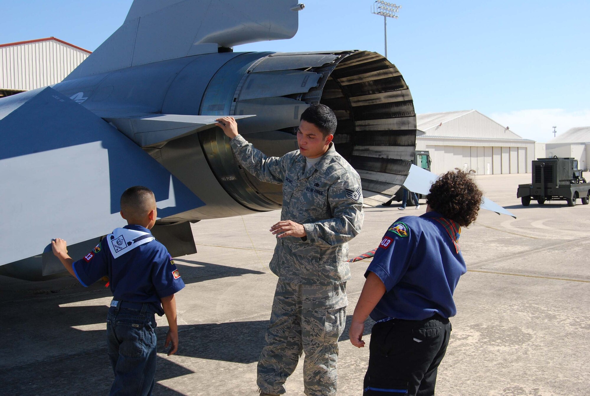 Boy Scout Troop 413 from New Braunfels, Texas spent a few hours learning how to perform basic moves associated with posting the colors. Reservists with the 433rd Airlift Wing, all members of the Lackland Base Honor Guard, volunteered the day to instruct the boys on October 25, 2008. The boys learned proper marching, facing movements and how to carry the rifles and the flags. Wing members said the boys worked hard and showed determination and that they would volunteer to do it again because of the personal satisfaction they gained during the instruction day. Troop 413 also toured the Inter-American Air Forces Academy training aircraft after their training and a park clean-up project on Lackland. (U.S. Air Force Courtesy Photo)