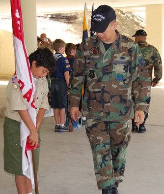 Boy Scout Troop 413 from New Braunfels, Texas spent a few hours learning how to perform basic moves associated with posting the colors. Reservists with the 433rd Airlift Wing, all members of the Lackland Base Honor Guard, volunteered the day to instruct the boys on October 25, 2008. The boys learned proper marching, facing movements and how to carry the rifles and the flags. Wing members said the boys worked hard and showed determination and that they would volunteer to do it again because of the personal satisfaction they gained during the instruction day. Troop 413 also toured the Inter-American Air Forces Academy training aircraft after their training and a park clean-up project on Lackland. (U.S. Air Force Courtesy Photo)