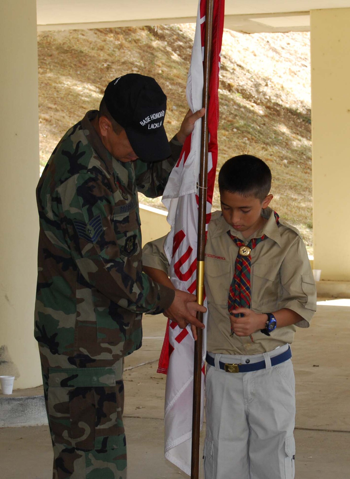Boy Scout Troop 413 from New Braunfels, Texas spent a few hours learning how to perform basic moves associated with posting the colors. Reservists with the 433rd Airlift Wing, all members of the Lackland Base Honor Guard, volunteered the day to instruct the boys on October 25, 2008. The boys learned proper marching, facing movements and how to carry the rifles and the flags. Wing members said the boys worked hard and showed determination and that they would volunteer to do it again because of the personal satisfaction they gained during the instruction day. Troop 413 also toured the Inter-American Air Forces Academy training aircraft after their training and a park clean-up project on Lackland. (U.S. Air Force Courtesy Photo)