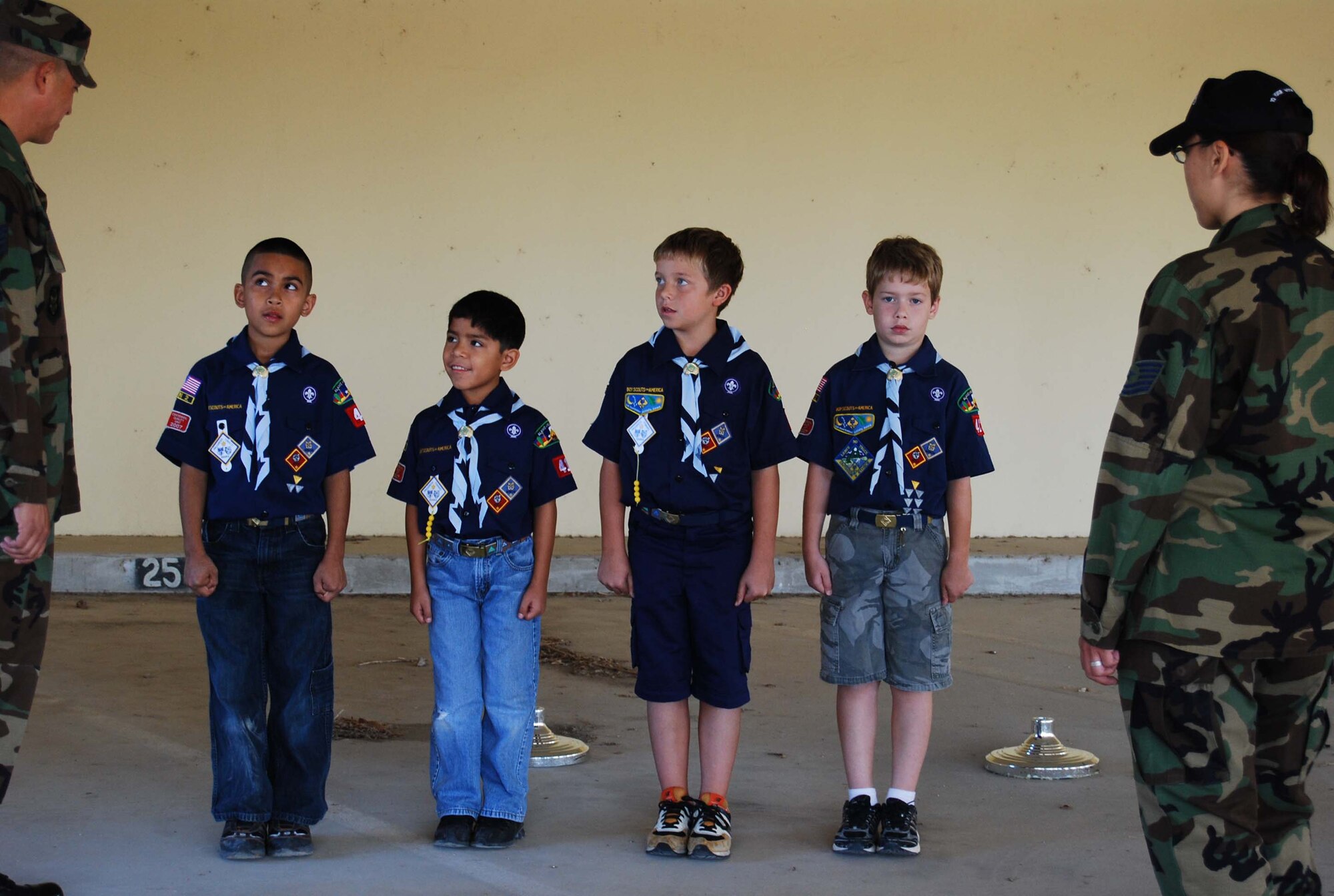 Boy Scout Troop 413 from New Braunfels, Texas spent a few hours learning how to perform basic moves associated with posting the colors. Reservists with the 433rd Airlift Wing, all members of the Lackland Base Honor Guard, volunteered the day to instruct the boys on October 25, 2008. The boys learned proper marching, facing movements and how to carry the rifles and the flags. Wing members said the boys worked hard and showed determination and that they would volunteer to do it again because of the personal satisfaction they gained during the instruction day. Troop 413 also toured the Inter-American Air Forces Academy training aircraft after their training and a park clean-up project on Lackland. (U.S. Air Force Courtesy Photo)