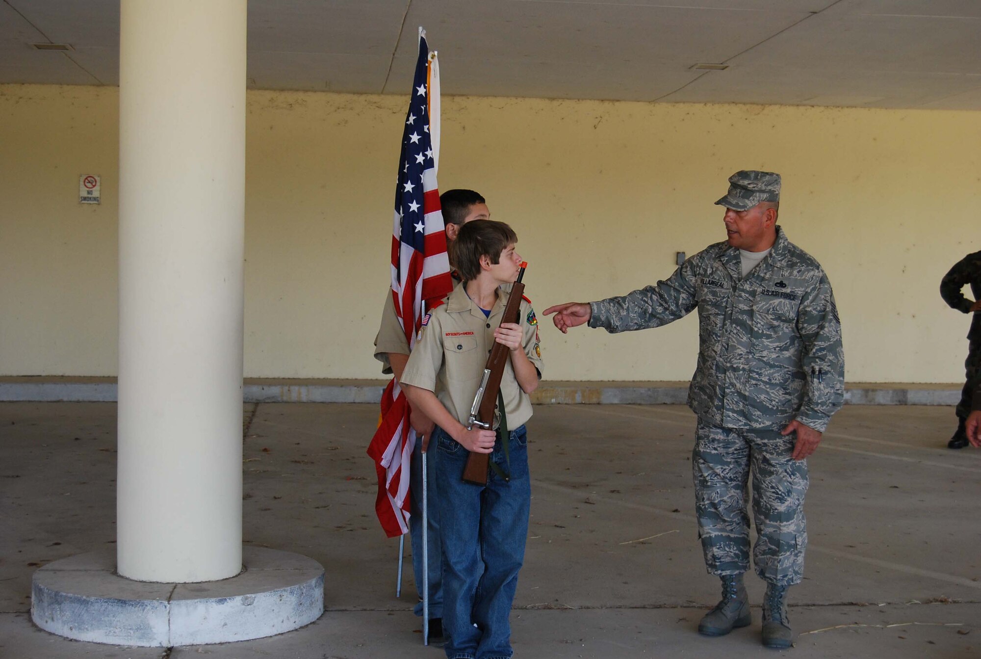 Boy Scout Troop 413 from New Braunfels, Texas spent a few hours learning how to perform basic moves associated with posting the colors. Reservists with the 433rd Airlift Wing, all members of the Lackland Base Honor Guard, volunteered the day to instruct the boys on October 25, 2008. The boys learned proper marching, facing movements and how to carry the rifles and the flags. Wing members said the boys worked hard and showed determination and that they would volunteer to do it again because of the personal satisfaction they gained during the instruction day. Troop 413 also toured the Inter-American Air Forces Academy training aircraft after their training and a park clean-up project on Lackland. (U.S. Air Force Courtesy Photo)